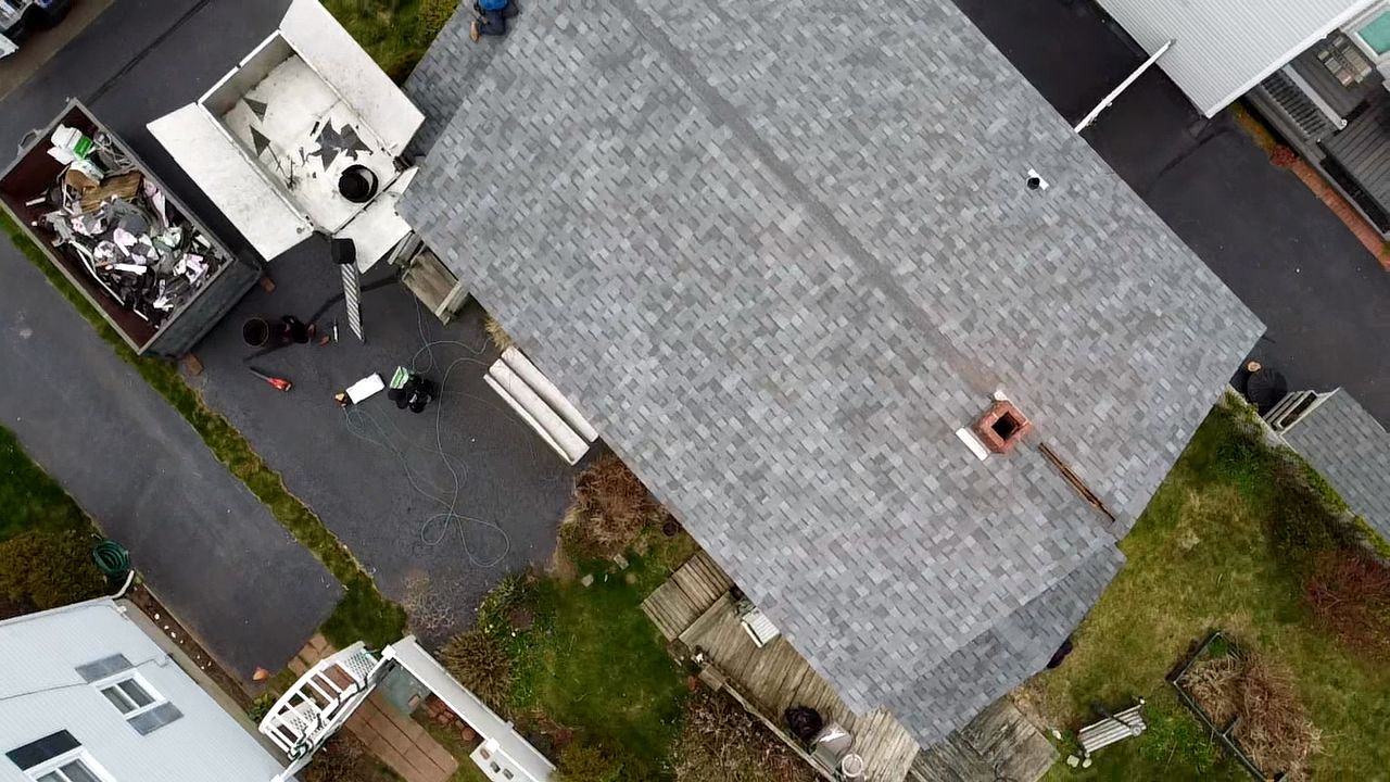 Residential Roofing Installation using Owens Corning Duration Slatestone Gray by A Plus Exterior