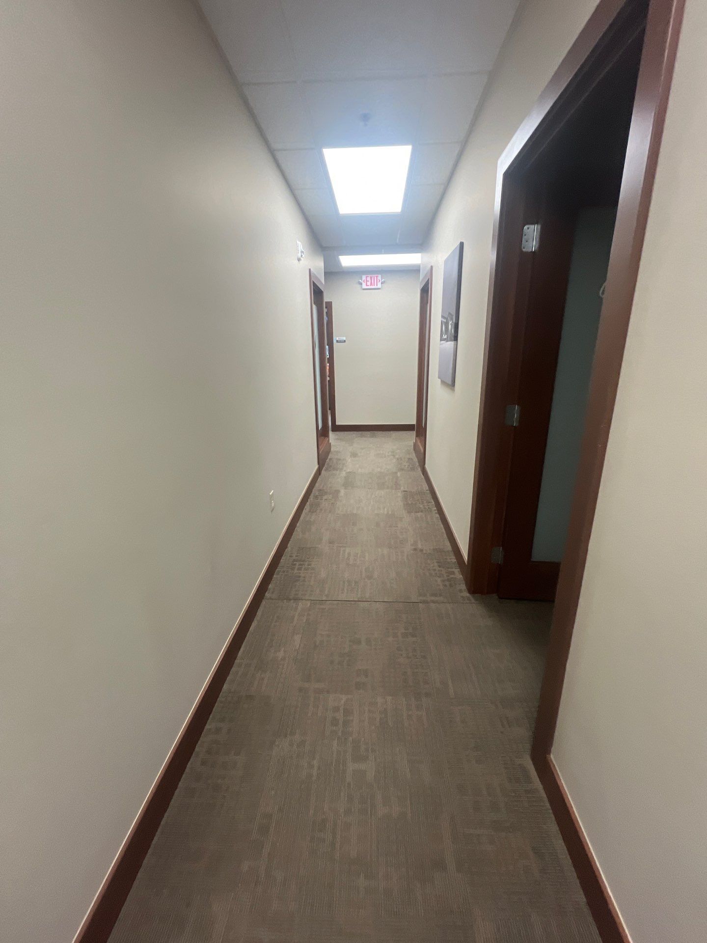 Commercial Office Interior Remodel and Modern Suite Refresh in Sioux Falls by Select Painting, Coatings & Garage Cabinets