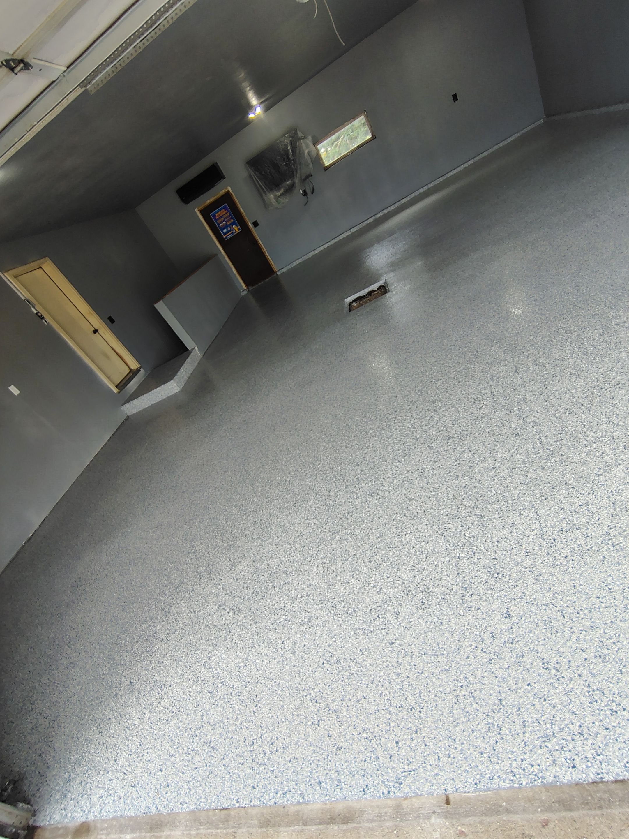 Garage Floor Concrete Coating and Surface Restoration in Colman by Select Painting, Coatings & Garage Cabinets