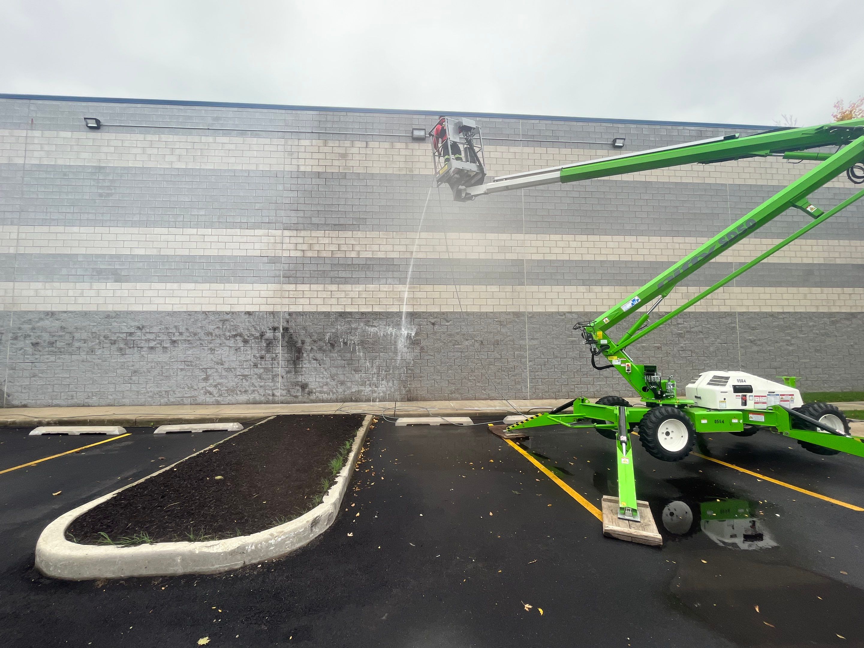 commercial pressure washing using Algaecide, soft wash soap by Northern Power Washing LLC.