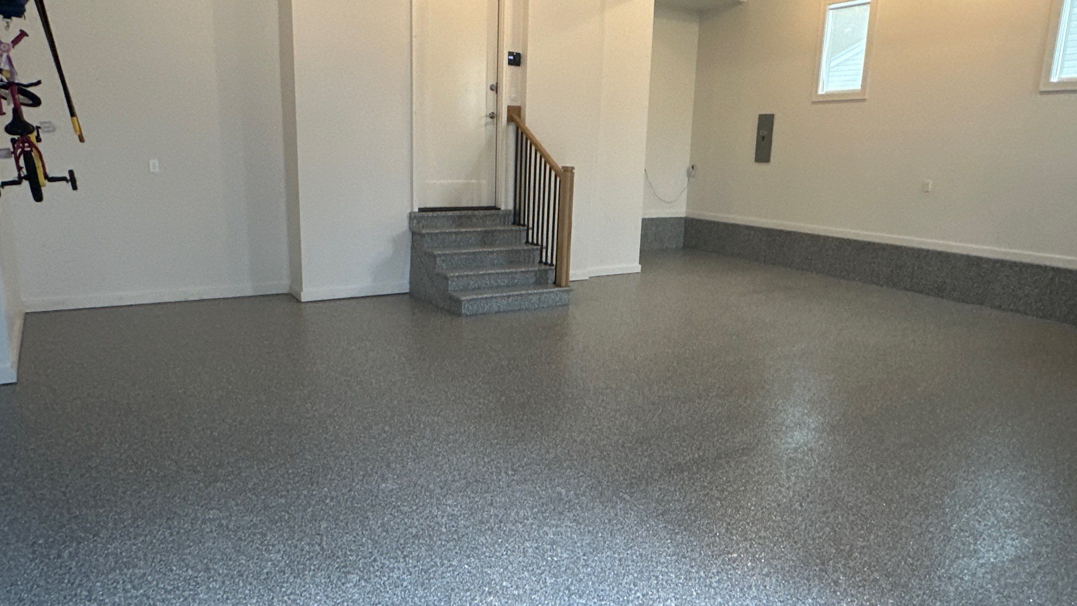 Max R. upgraded his garage with overhead racks and a New floor  by Banner Garage