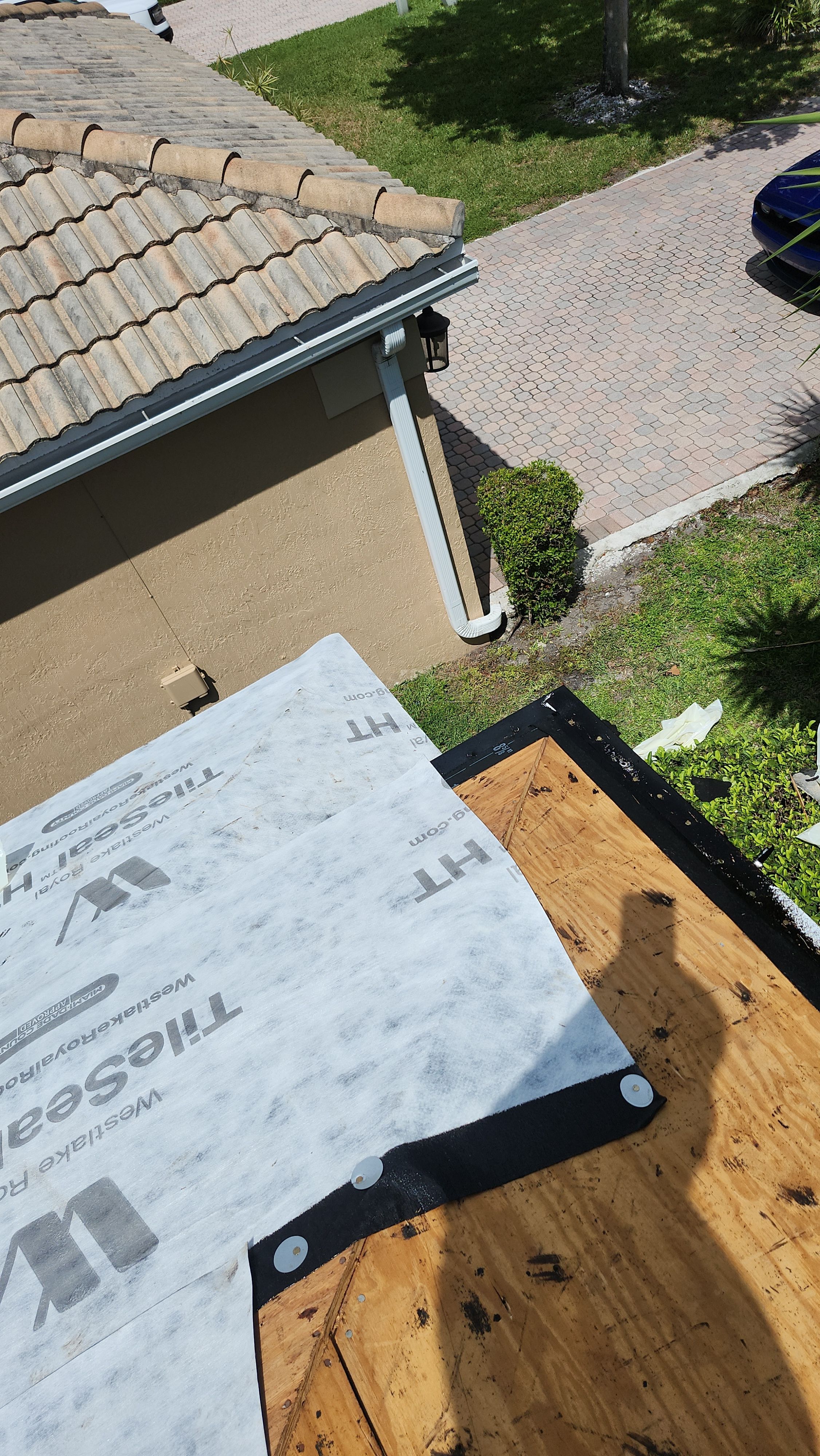 Tile Roof Replacement and Sheathing Repair in Boynton Beach by Aastro Roofing