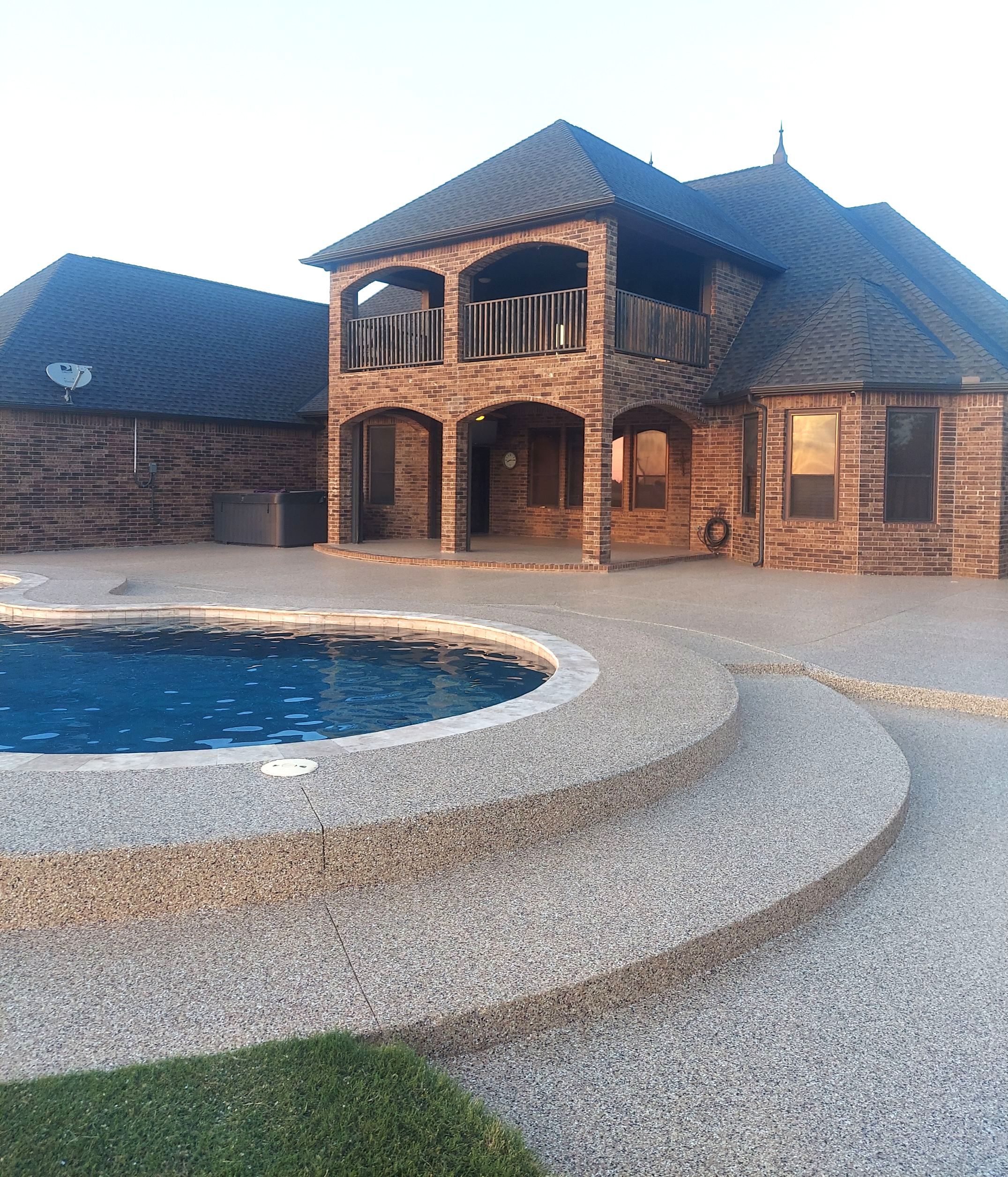 Patio & Pool Deck Coating with Sandstone by Copperhead Coatings