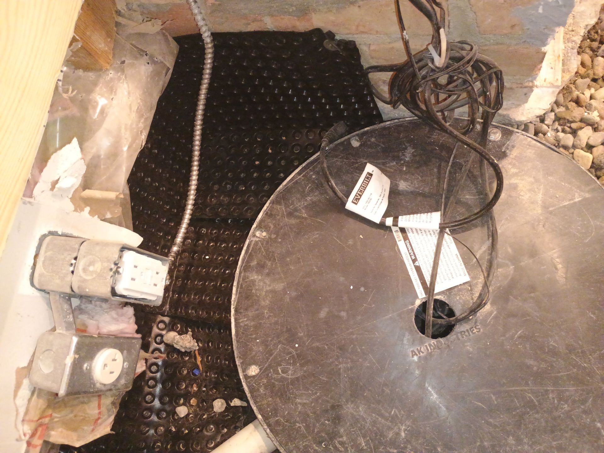 Interior Drain Tile & Sump Pump in Northwest Minneapolis by Waterproofing Northeast