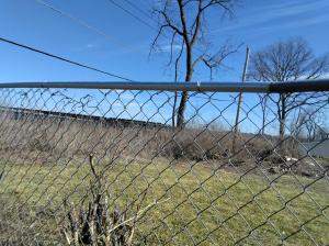 Chain Link Fence Repair and Custom Gate Installation – East St. Louis, IL by Legendary Services Company LLC.