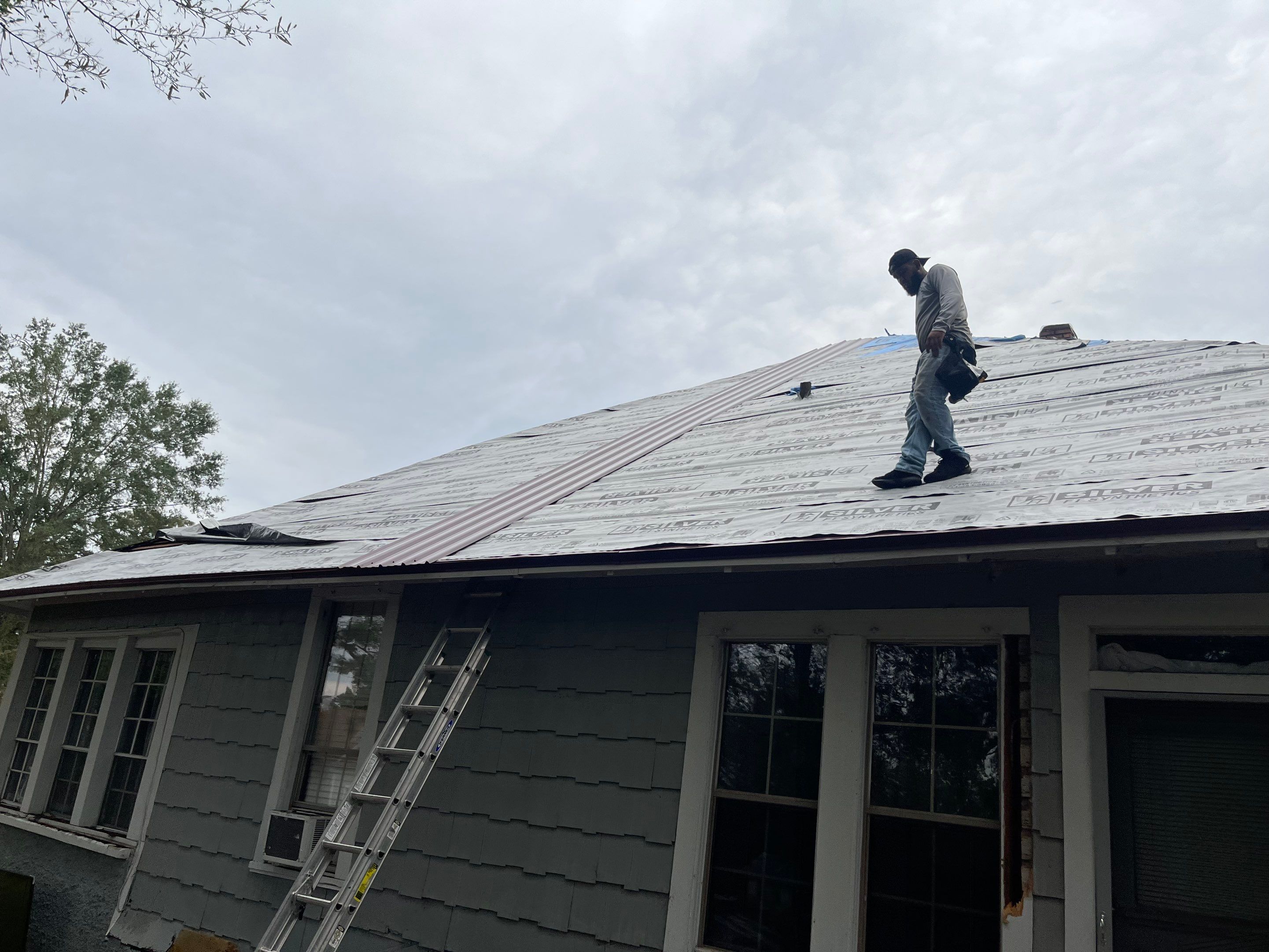 Residential Metal Roof Replacement using Reed's Metals: Colored Residental Panel (Burgundy) by Hostetler Roofing
