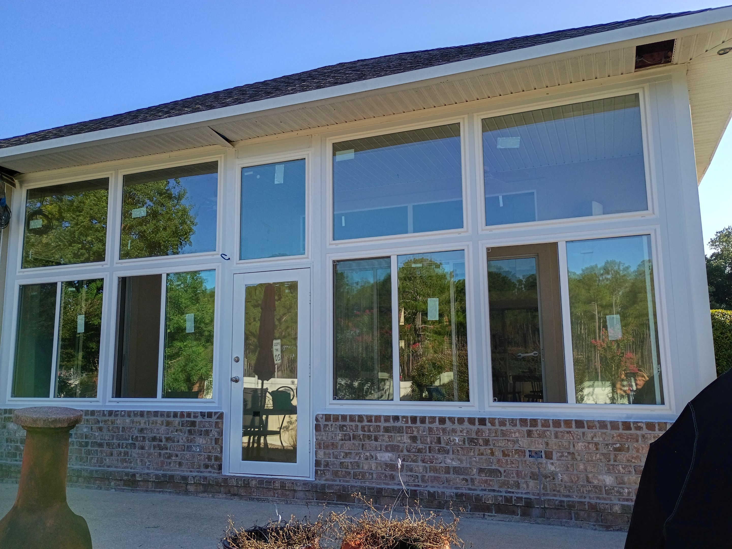 Screen Room Conversion to Glass Under  by Titan Sunrooms