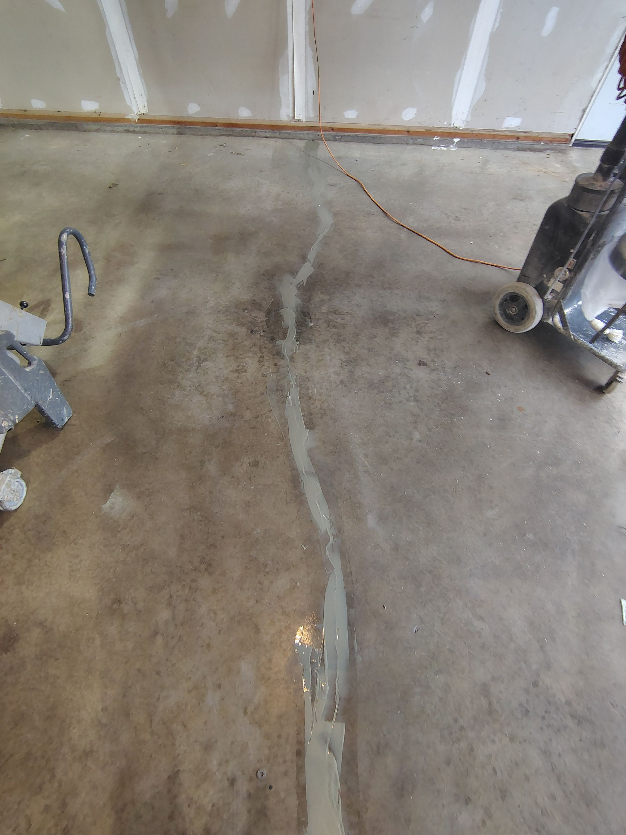 Sioux Falls Garage Concrete Grinding and Nightfall Decorative Chip Coating by Select Painting, Coatings & Garage Cabinets