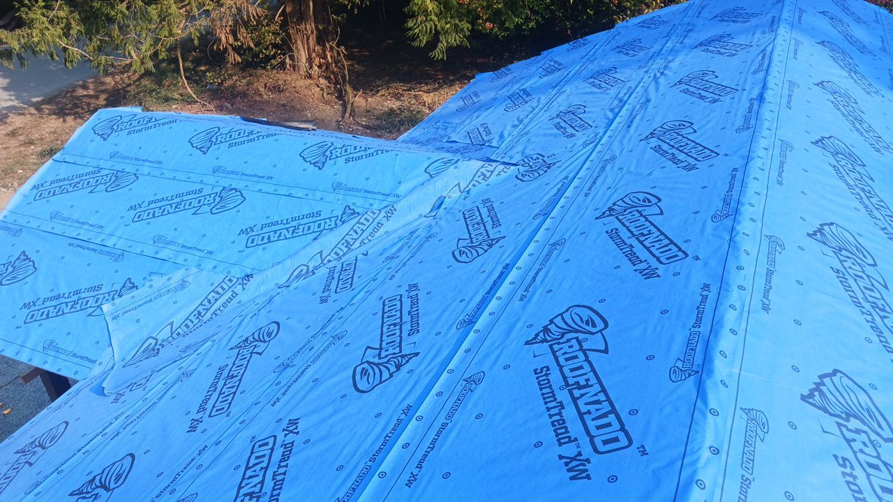 Residential Roofing Installation using OC Oakridge shingles by Top Notch Roofing Inc