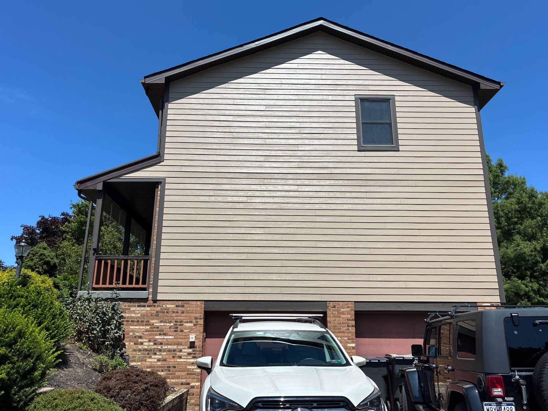 Full House James Hardie Lap Siding and Trim Renovation With Modern Dark Trim In Wexford / Mars PA by Ideal Siding Pittsburgh
