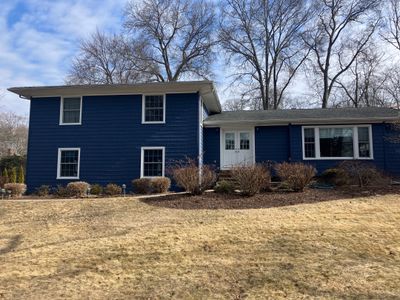 Elevated Siding with Cert Cedar Impressions D/7 Perfection straight bottom, Midnight Blue and Cert Monogram D/4 x 25' clapboard, Midnight Blue
