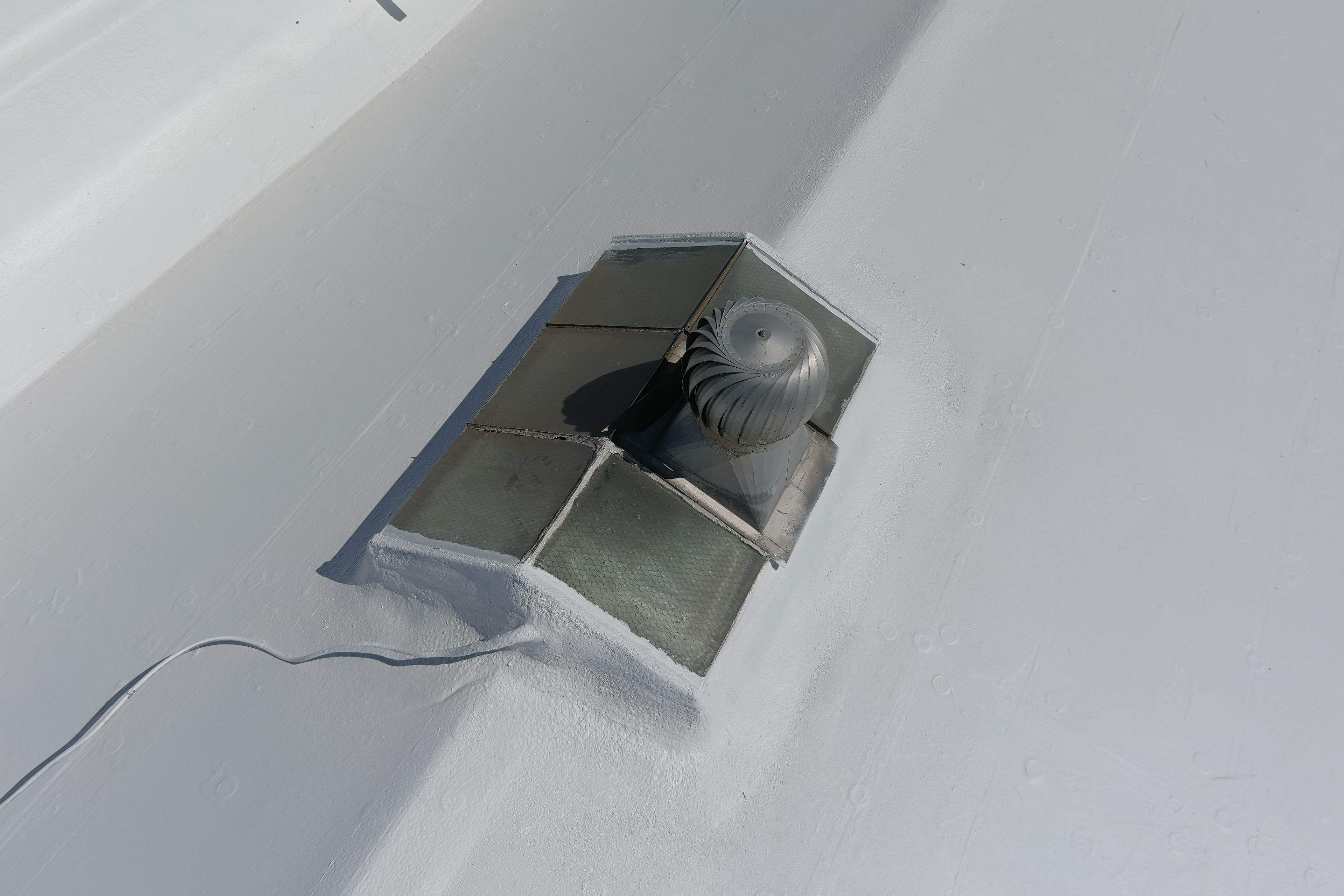 Commercial Roofing Installation using Conklin BenchPly system with PUMA top coat (imbedded fabric system) by Straight Edge Roofing Inc