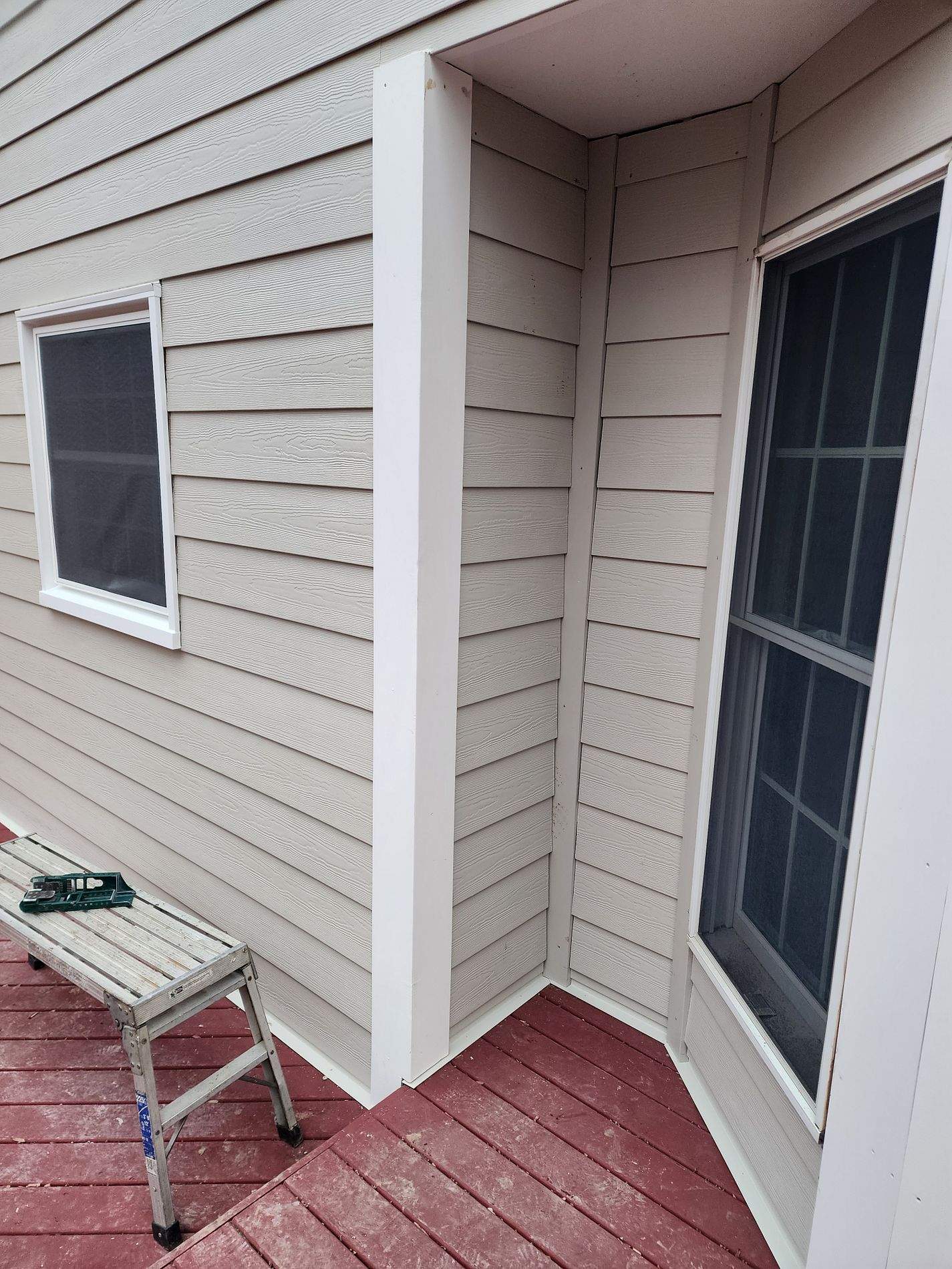 Siding Installation using James Hardie Siding- Cobblestone & Provia Signet Entry Door by Roof Right Inc