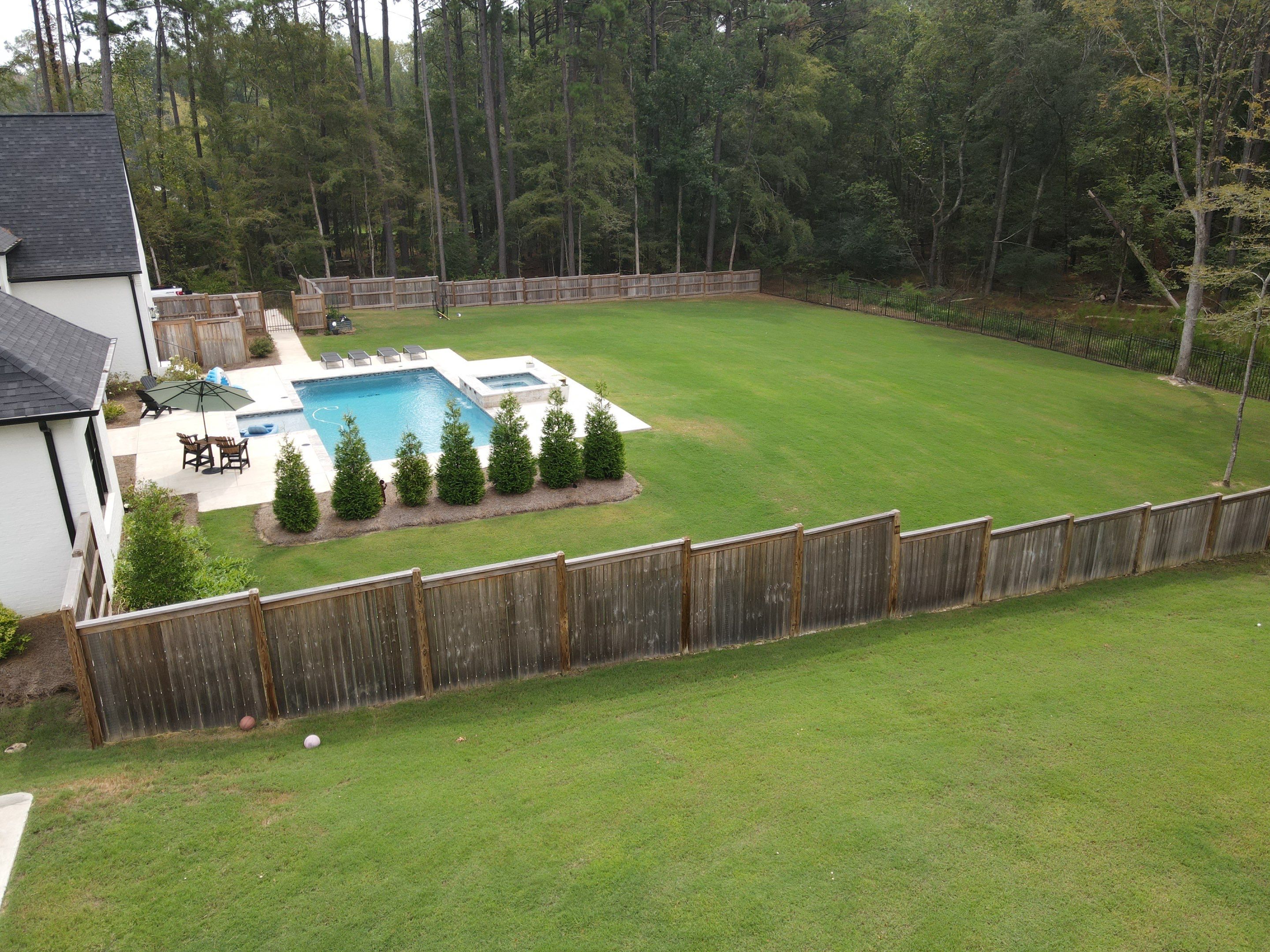Fence Stain using Wood Defender Black  by Roberson Construction LLC