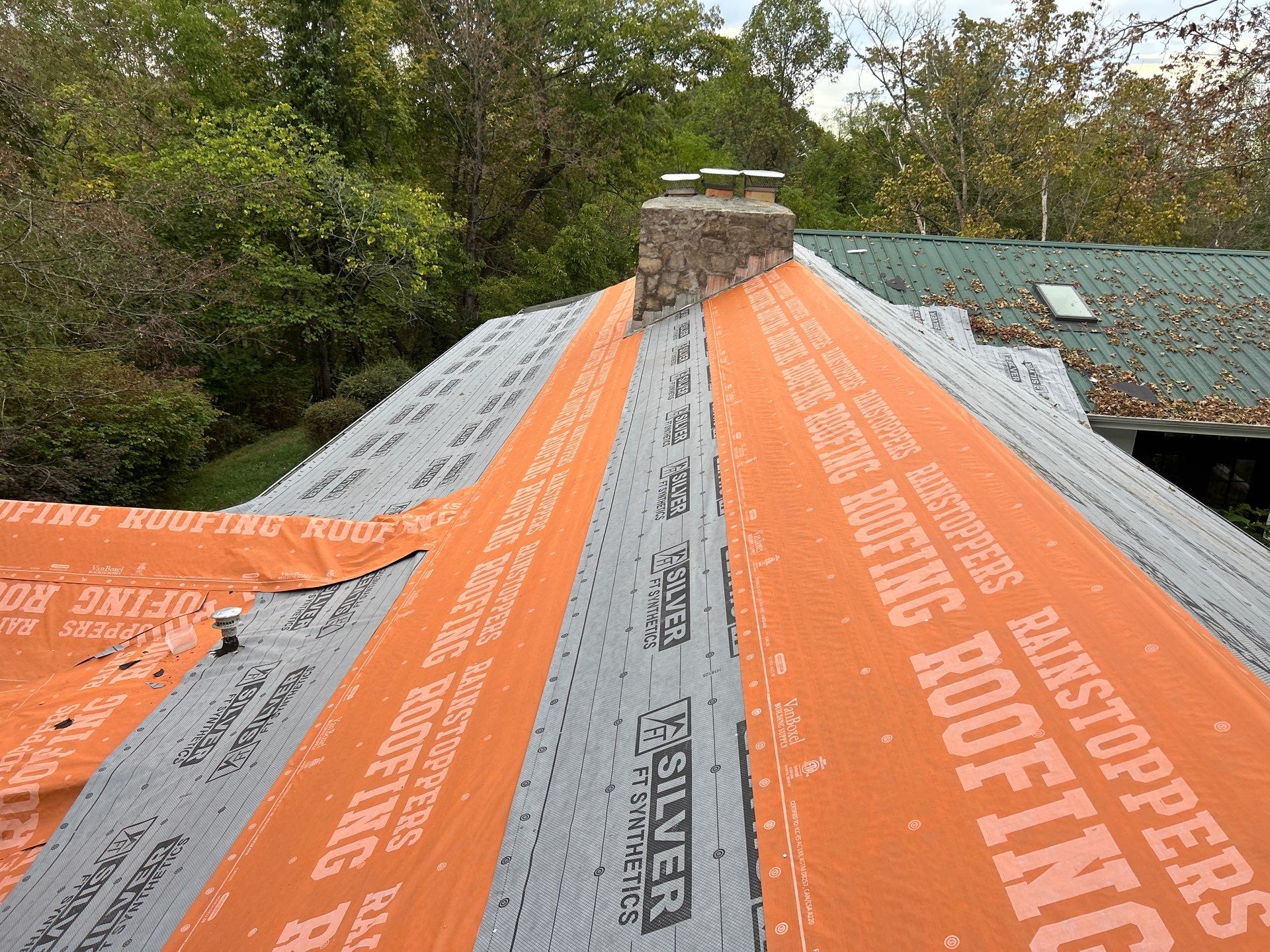 Residential Roofing Installation using Metal by Rainstoppers Roofing