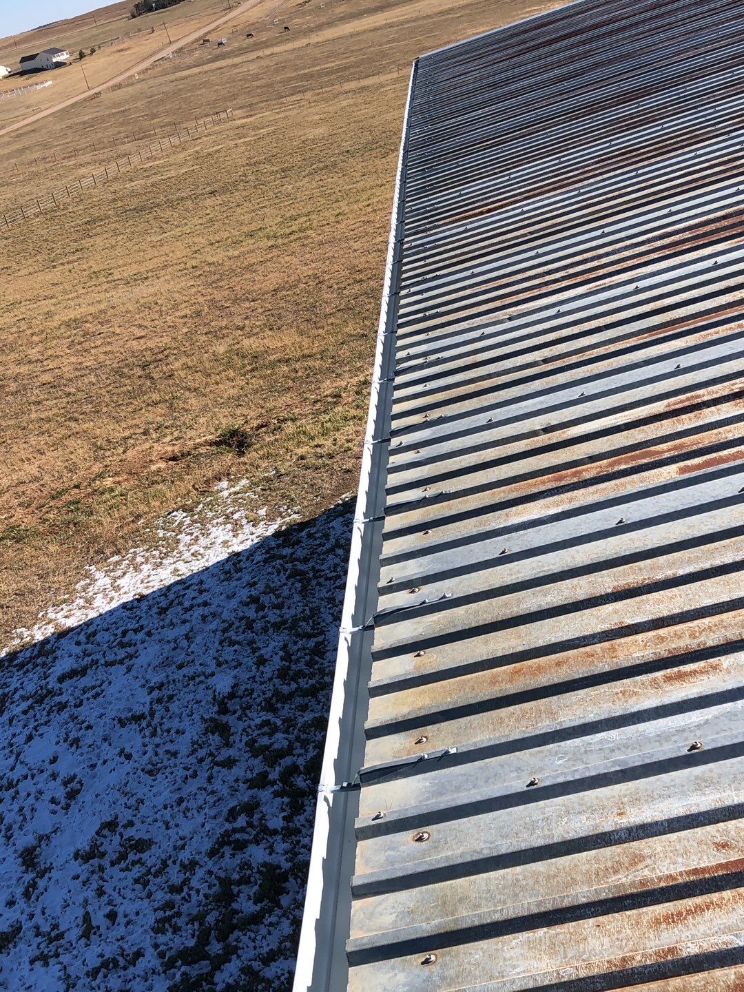 Residential Roofing Installation using Metal roofing by American Roofing & Construction LLC