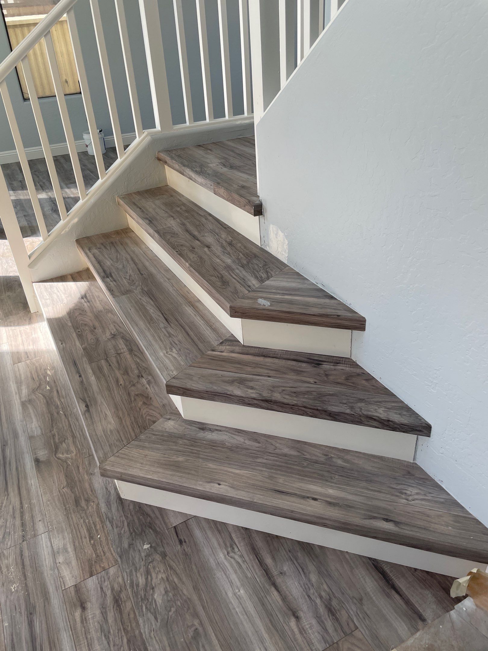Laminate Staircase and Flooring  by Footprints Floors of Chandler 