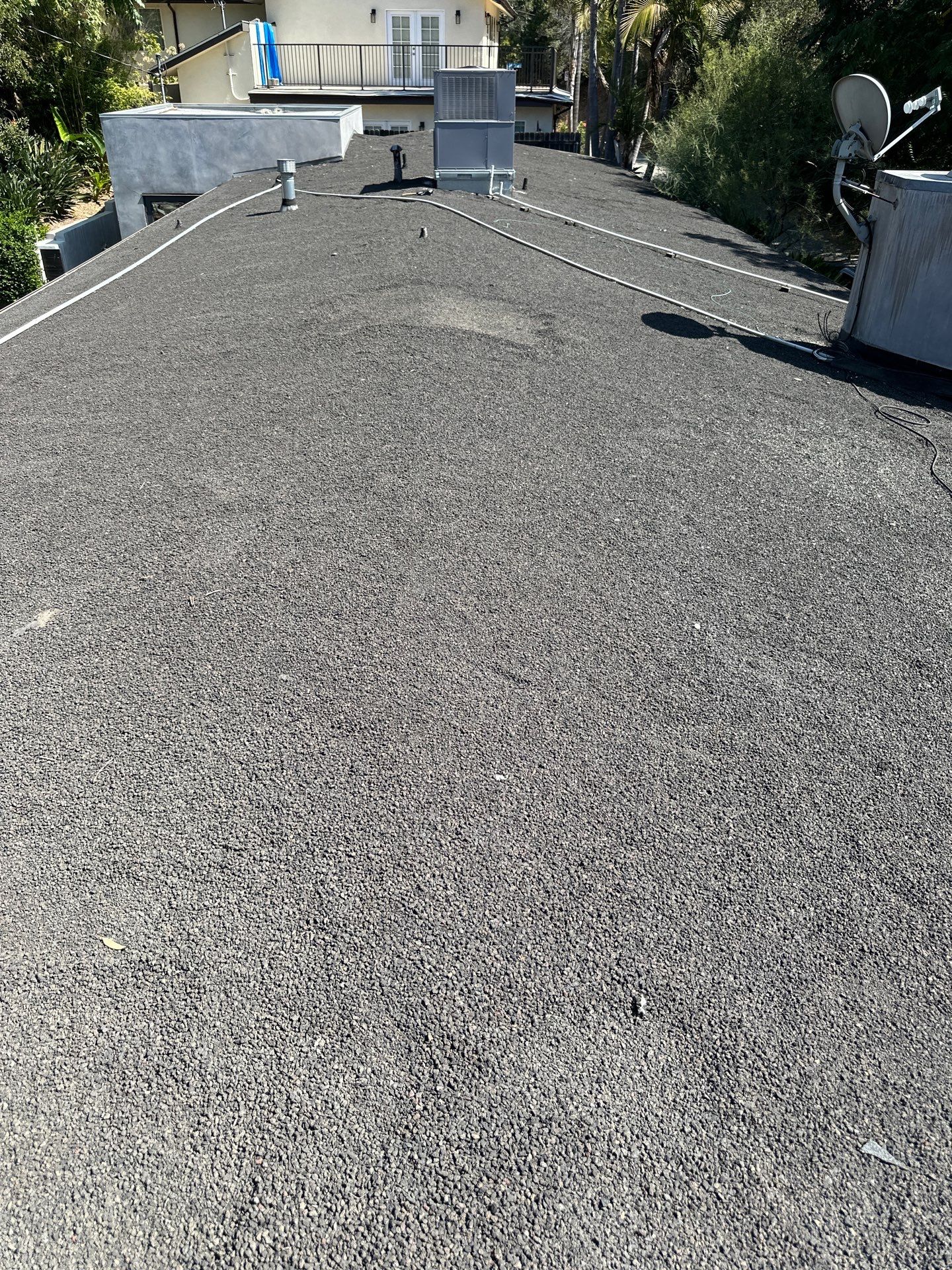 Residential Roofing Installation using Polyfresko® G Highly Reflective Modified Bitumen Cap Sheet by Hull Brothers Roofing