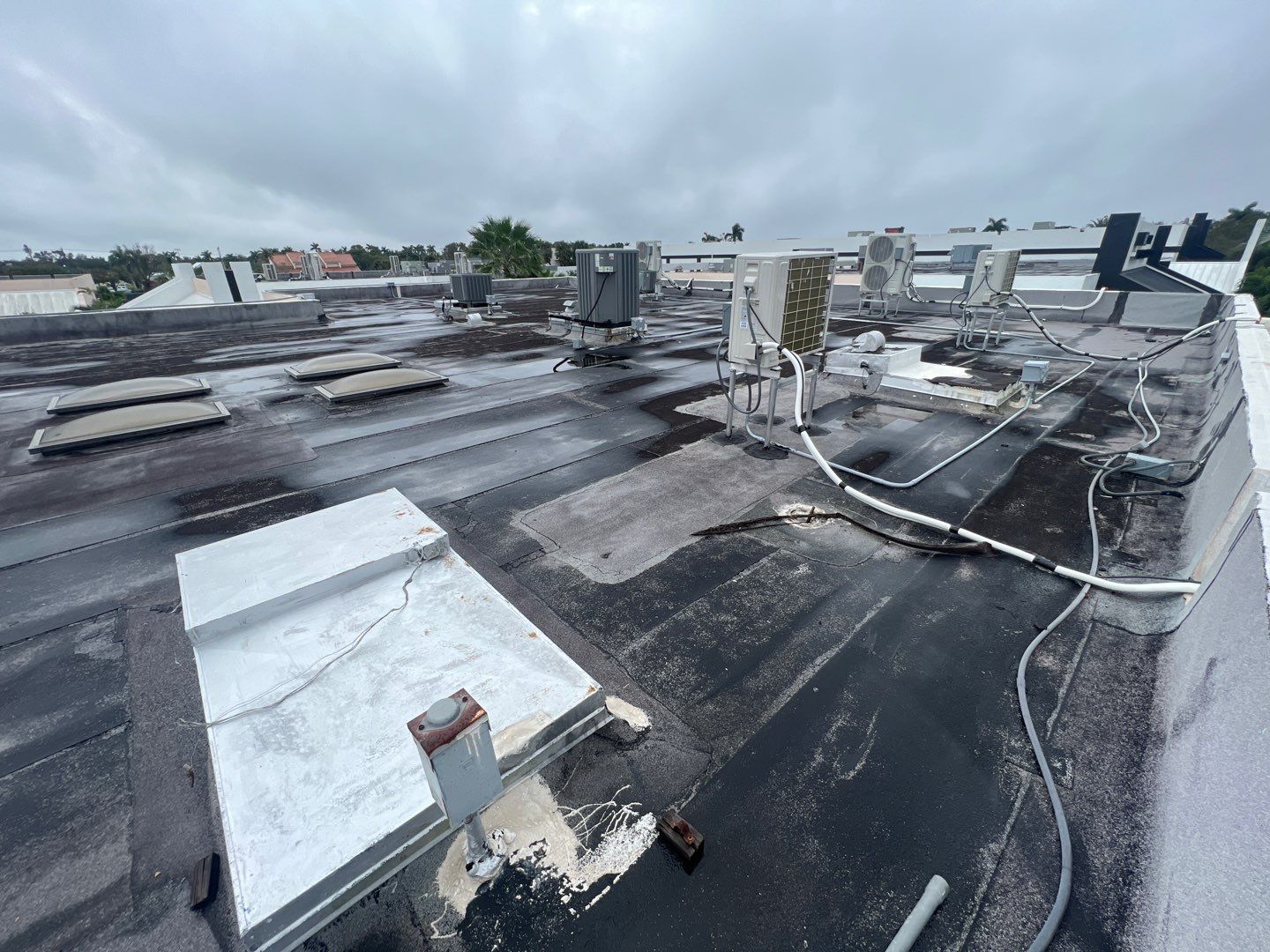 Commercial Roofing Repair using Roof Sealant by Four Peaks Roofing
