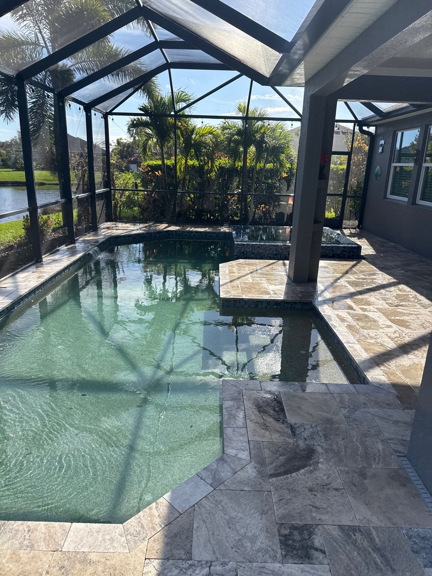 Travertine Pool Deck and Screen Enclosure Cleaning in Ellenton, FL | Oakleaf Hammock Community by Sunshine AquaWash
