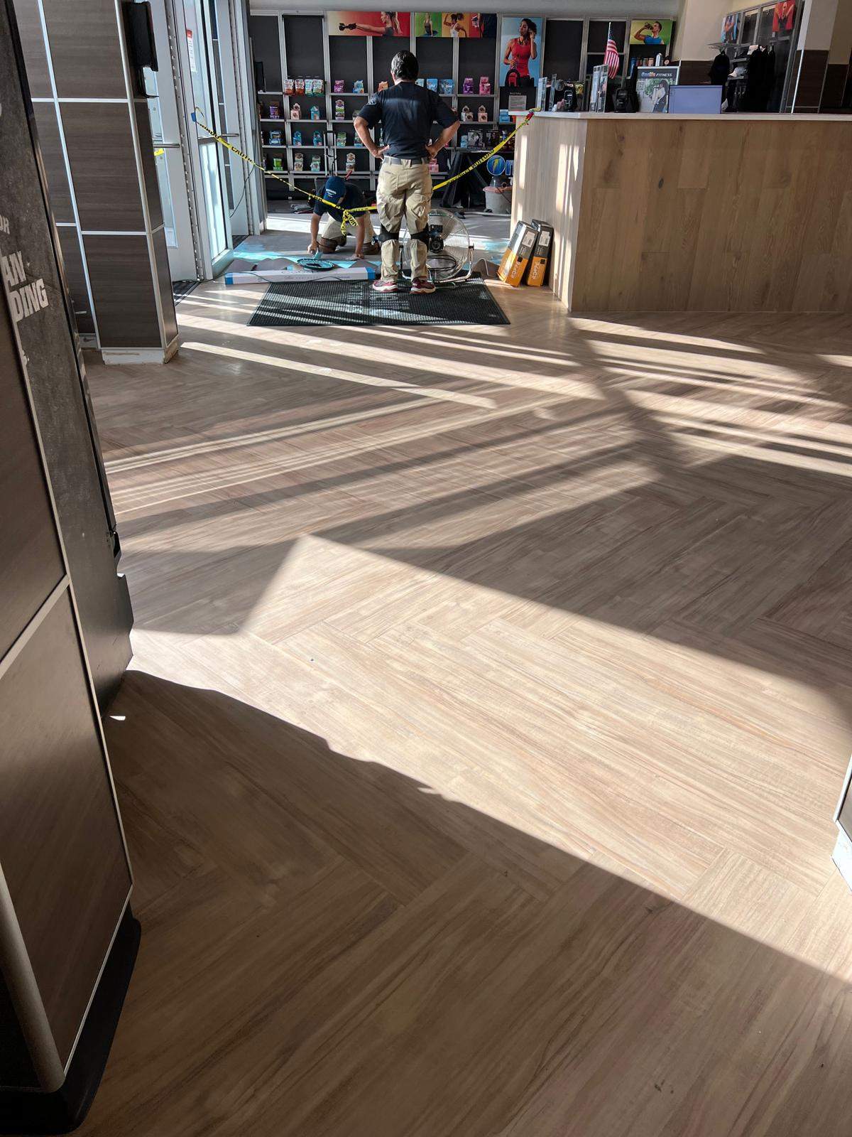 Fairfax OLF - Front desk renovation and flooring upgrades by Nova HomeWorks 