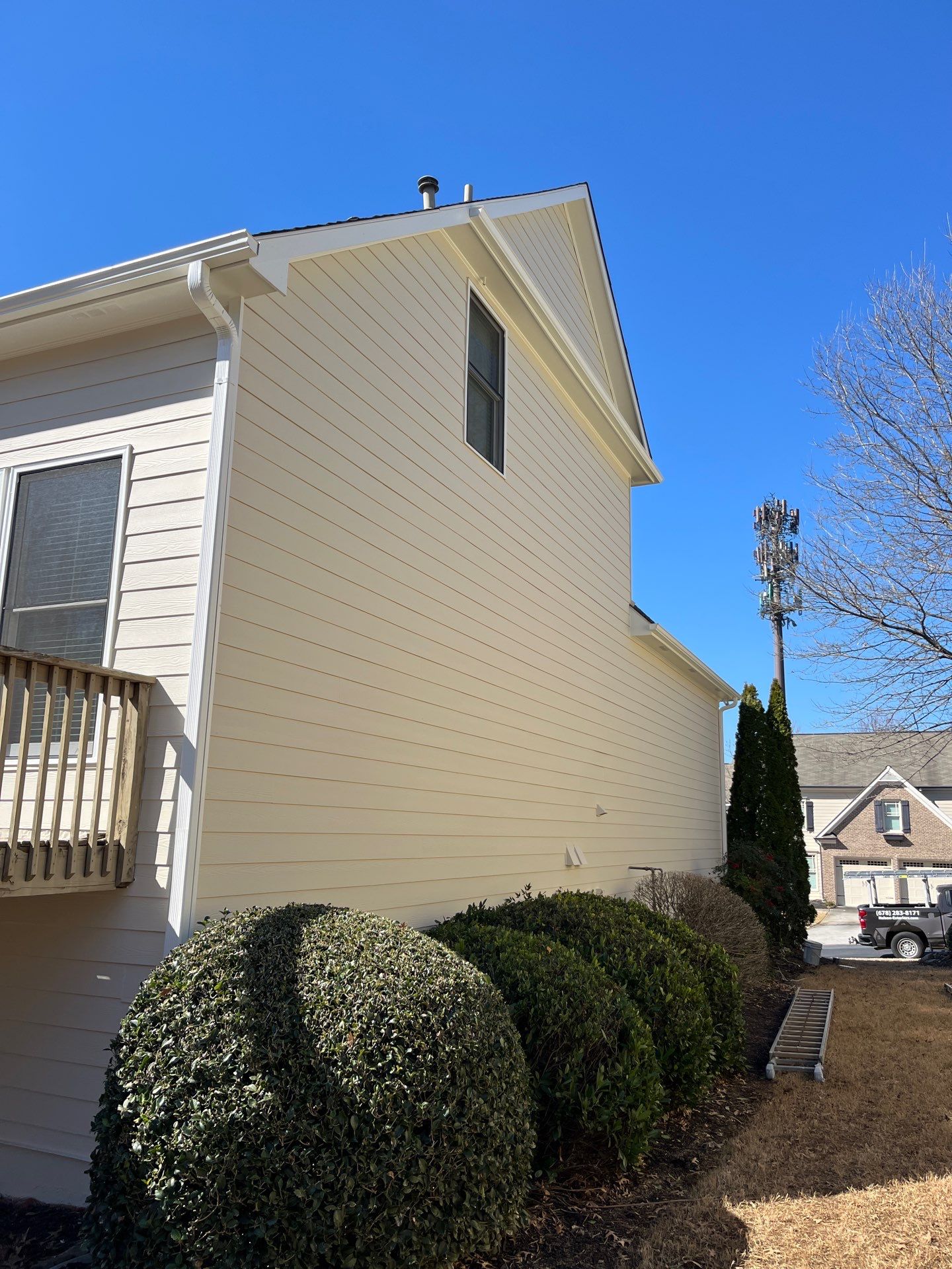 Garage Door and Home Exterior Painting and Rotten Wood Replacement in Marietta, GA by Nelson Exteriors