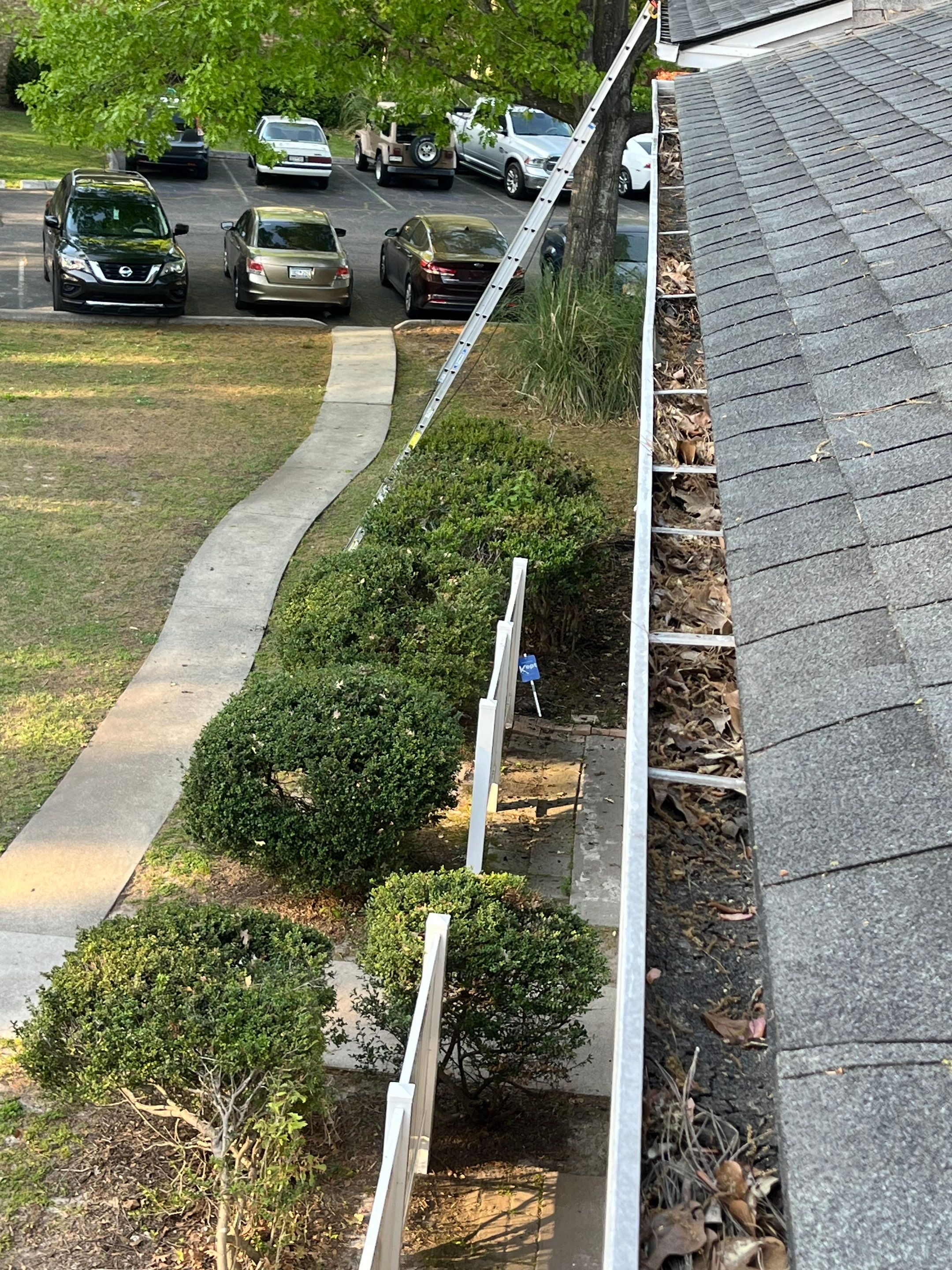 Commercial gutter cleaning Georgia before photo with filled gutters