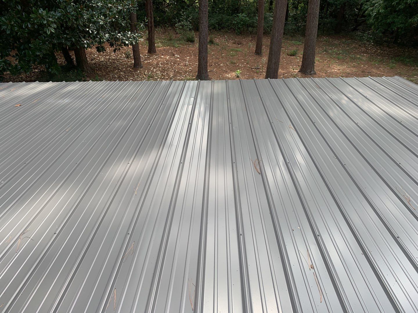 Re Roof (metal roofing) by American Roofing NC
