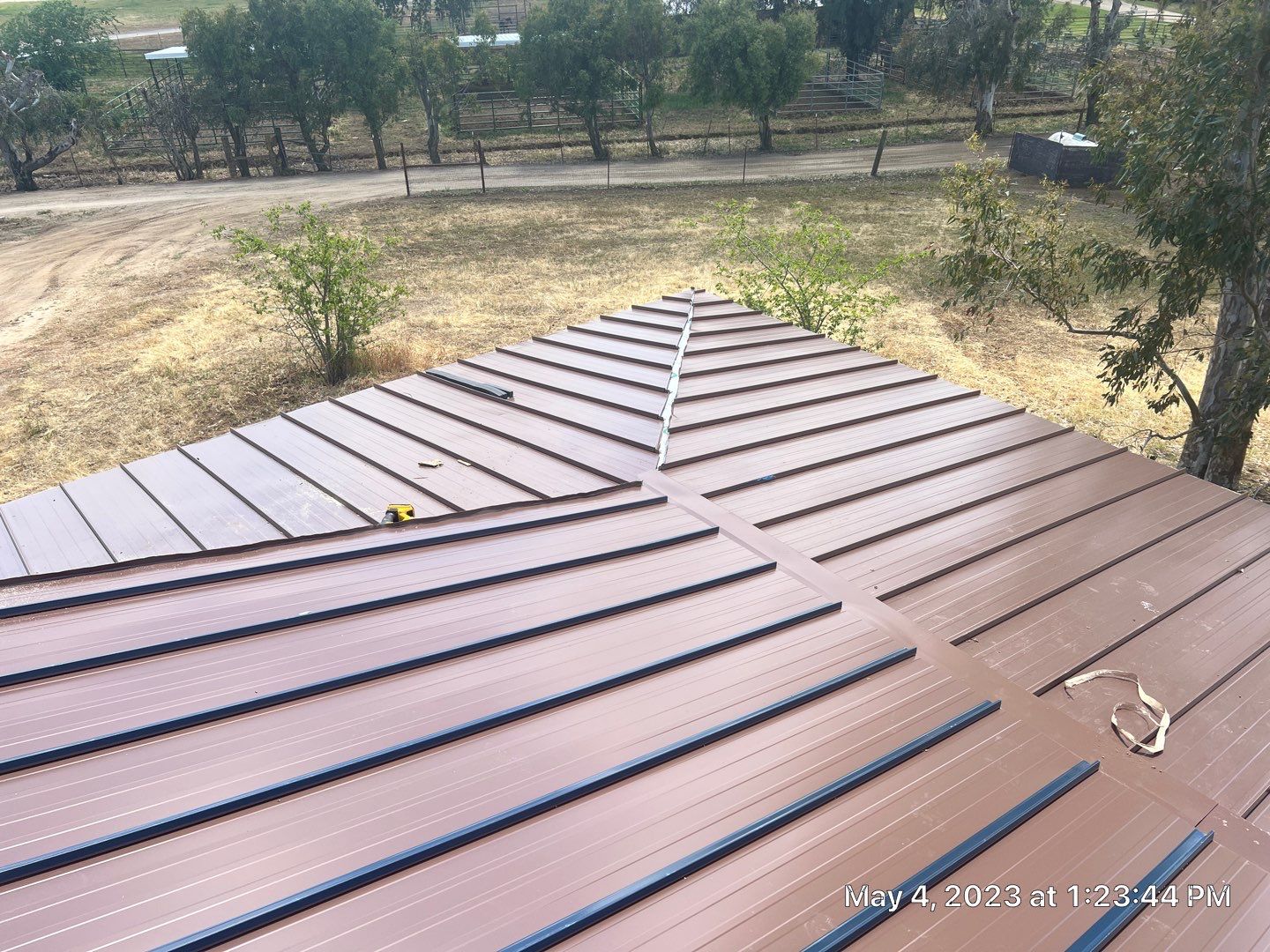 Metal roofing installation using Standing seam metal roofing system by Straight Edge Roofing Inc