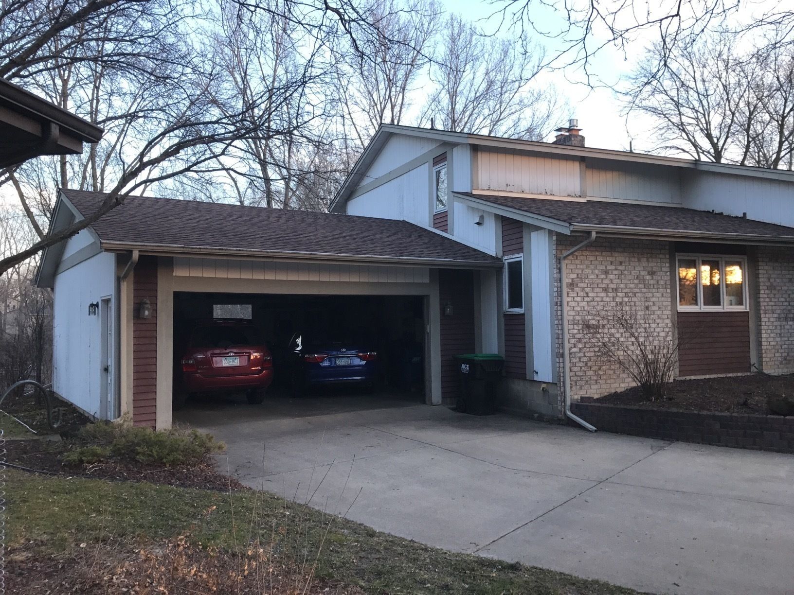 Siding Installation using LP SmartSide and Pella Vinyl Windows by MODERN EXTERIOR SYSTEMS