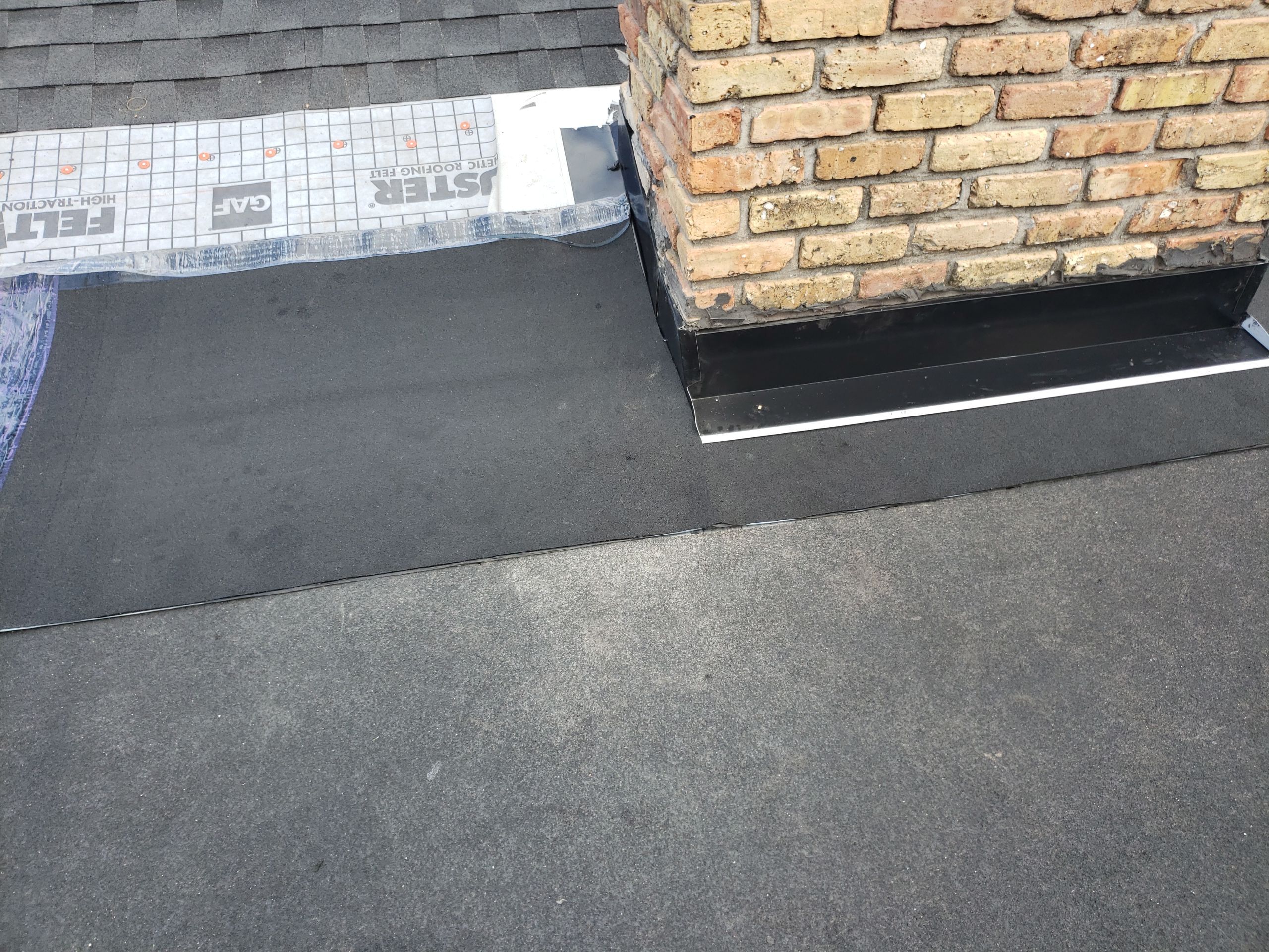 Residential Roofing Installation using Roof Replacement by American Roofing & Construction LLC