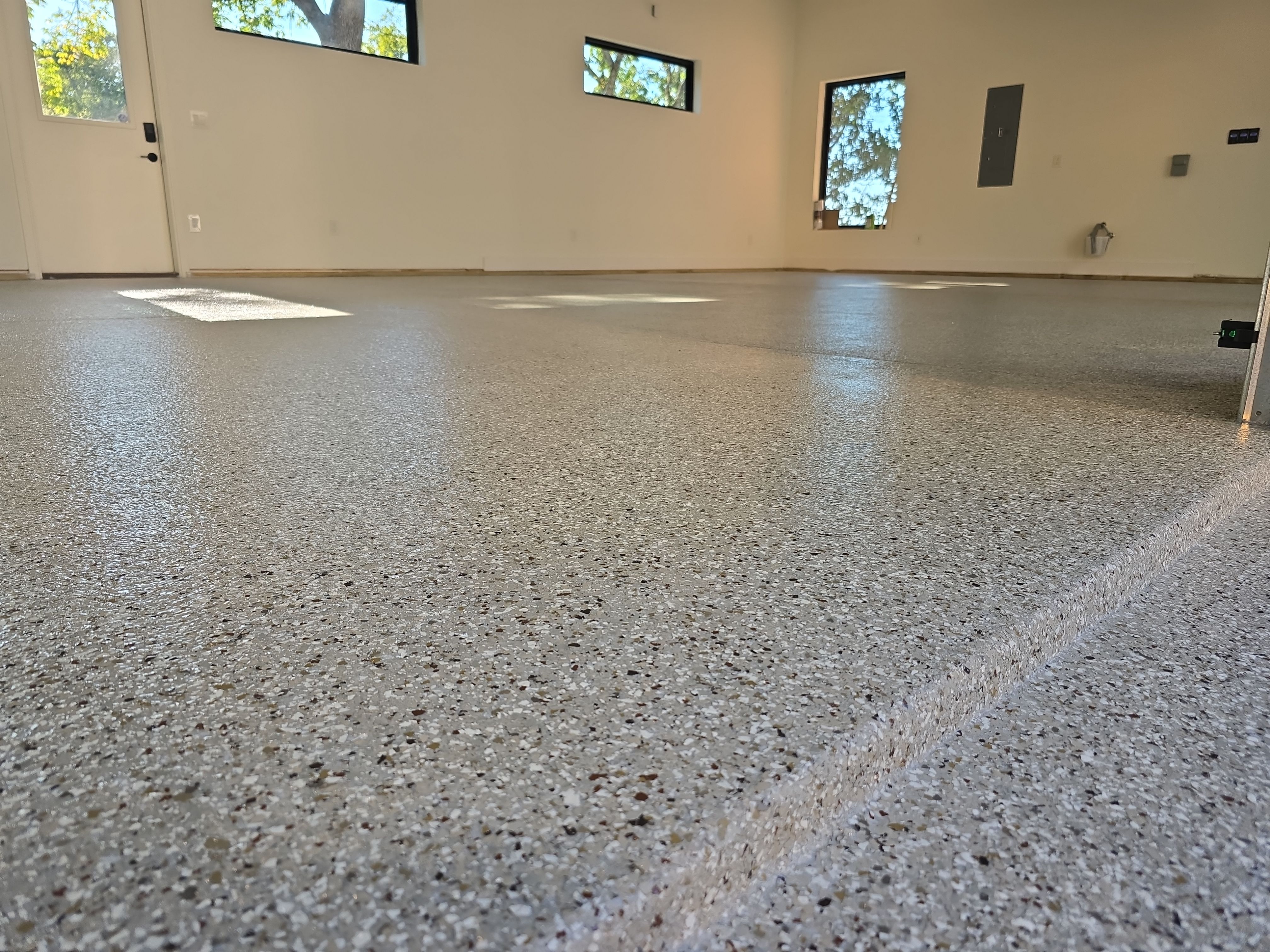 Garage using Creekbed by Elite Floor Solutions