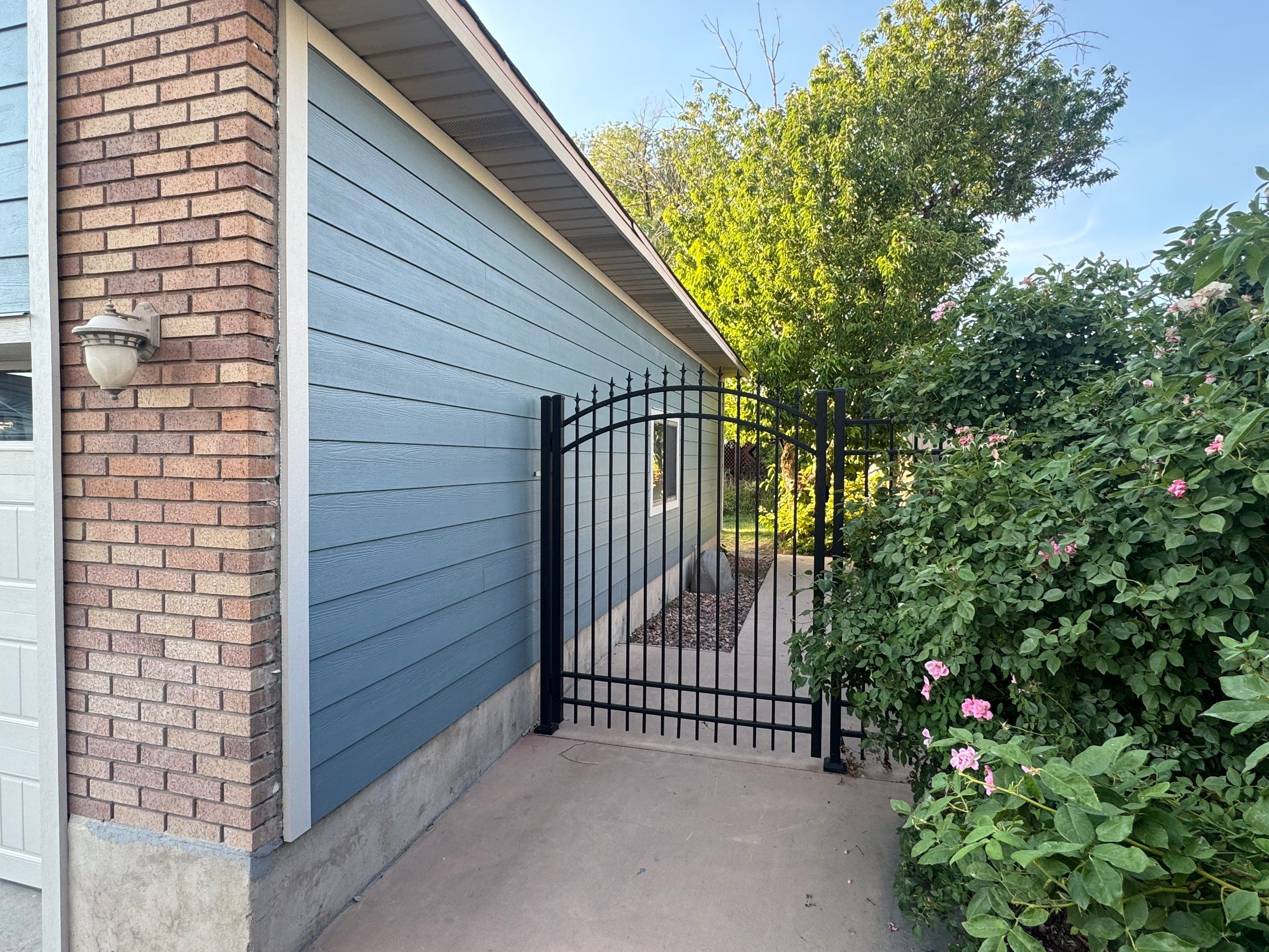 West Jordan | Hardie Lap Siding w/ Brick Accent | Boothbay Blue & Cobble Stone by Ideal Siding Utah