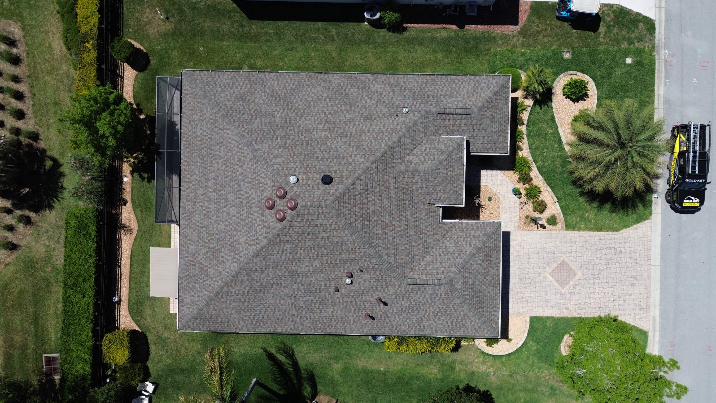 Before and after drone pictures in The Villages FL by Gold Key Roofing