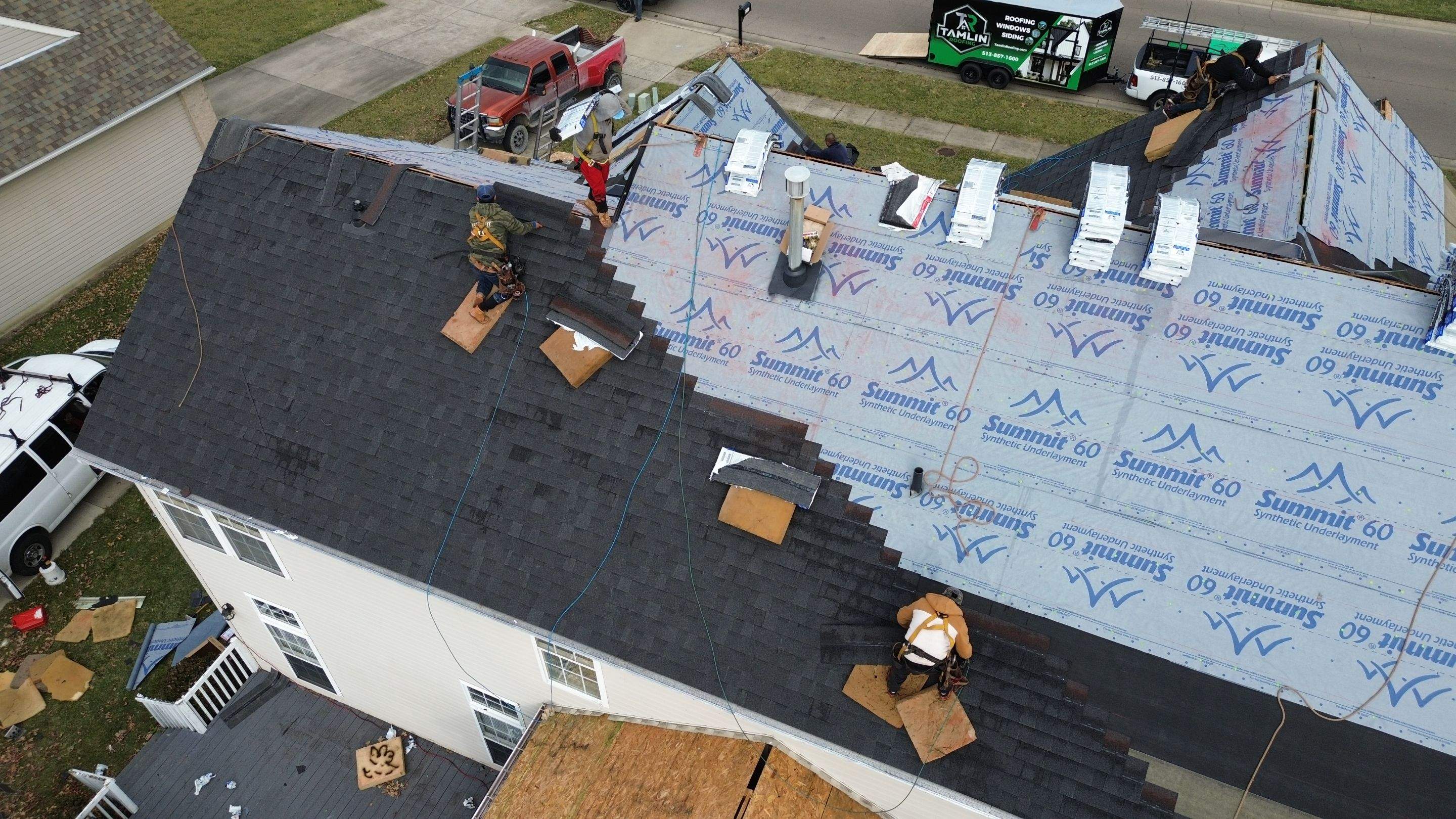 Walden Ponds - Pristine Black and Hydro Flo Gutter Guards by Tamlin Roofing