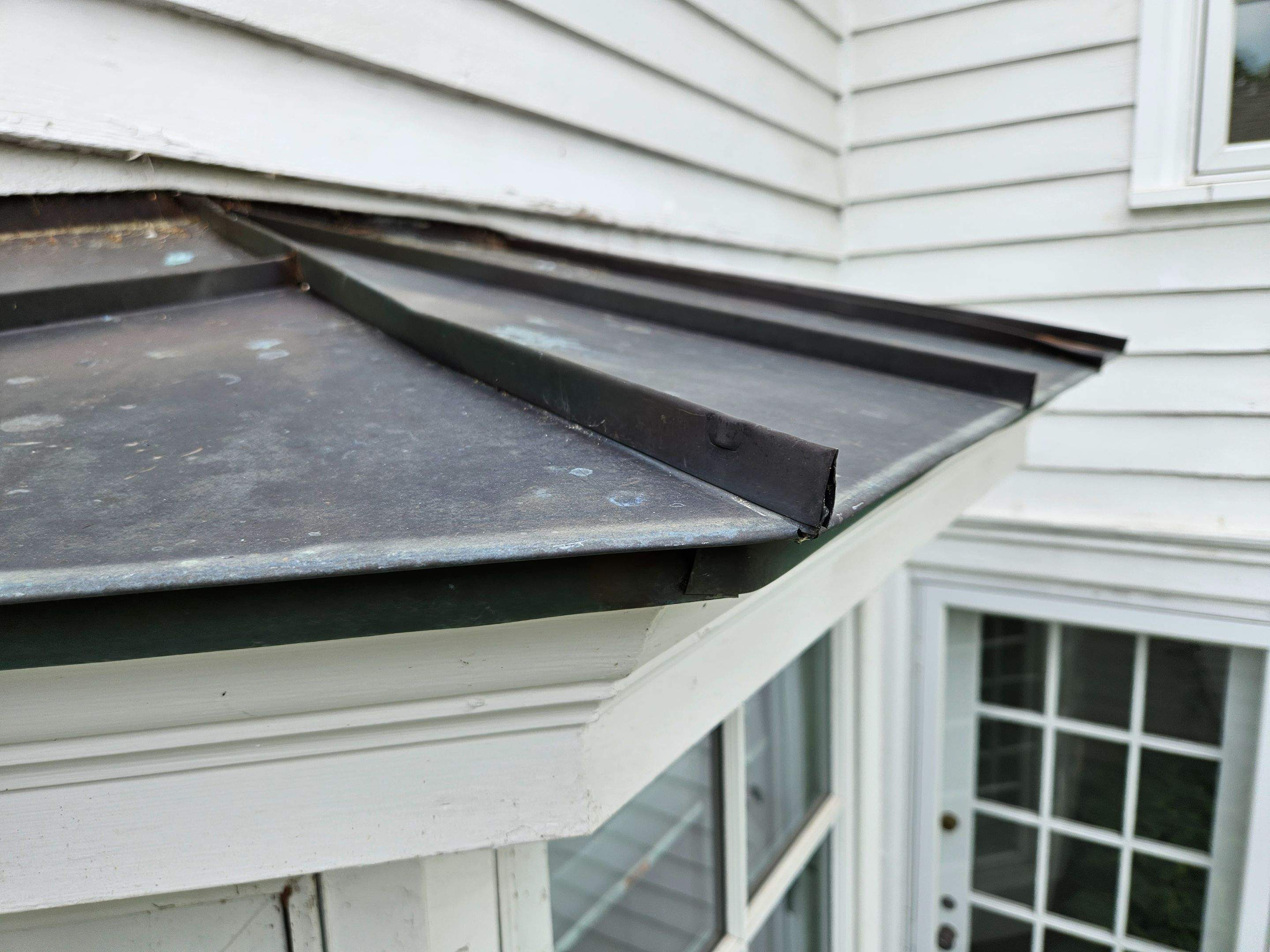 Copper Roof using Copper by Absolute Roofing and Construction