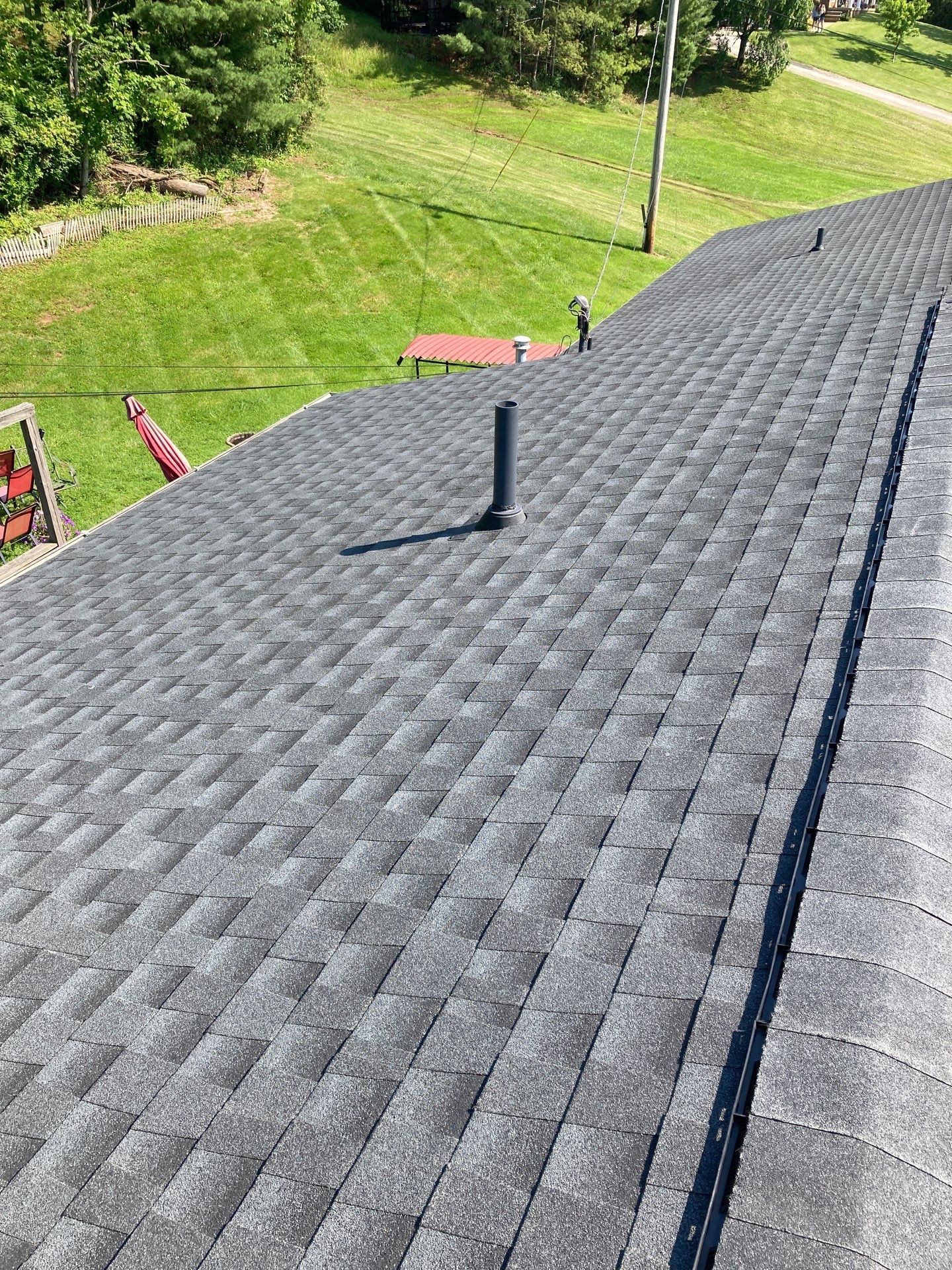 Residential Roofing Installation using GAF Timberline HDZ Charcoal by Rainstoppers Roofing