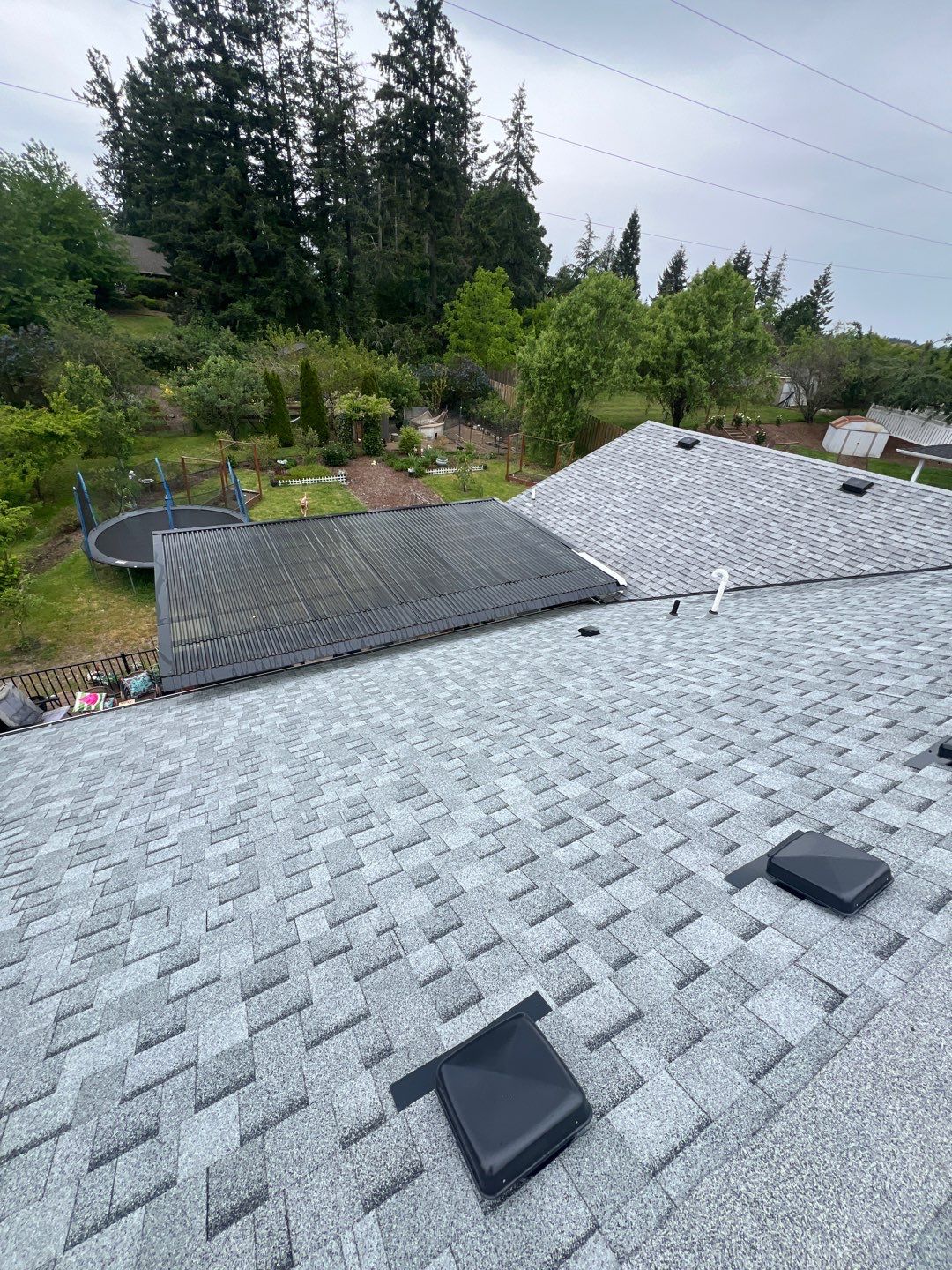 Residential Roofing Installation using IKO Cambridge (Color: Dual Grey) by Orezona Building & Roofing Company, Inc.