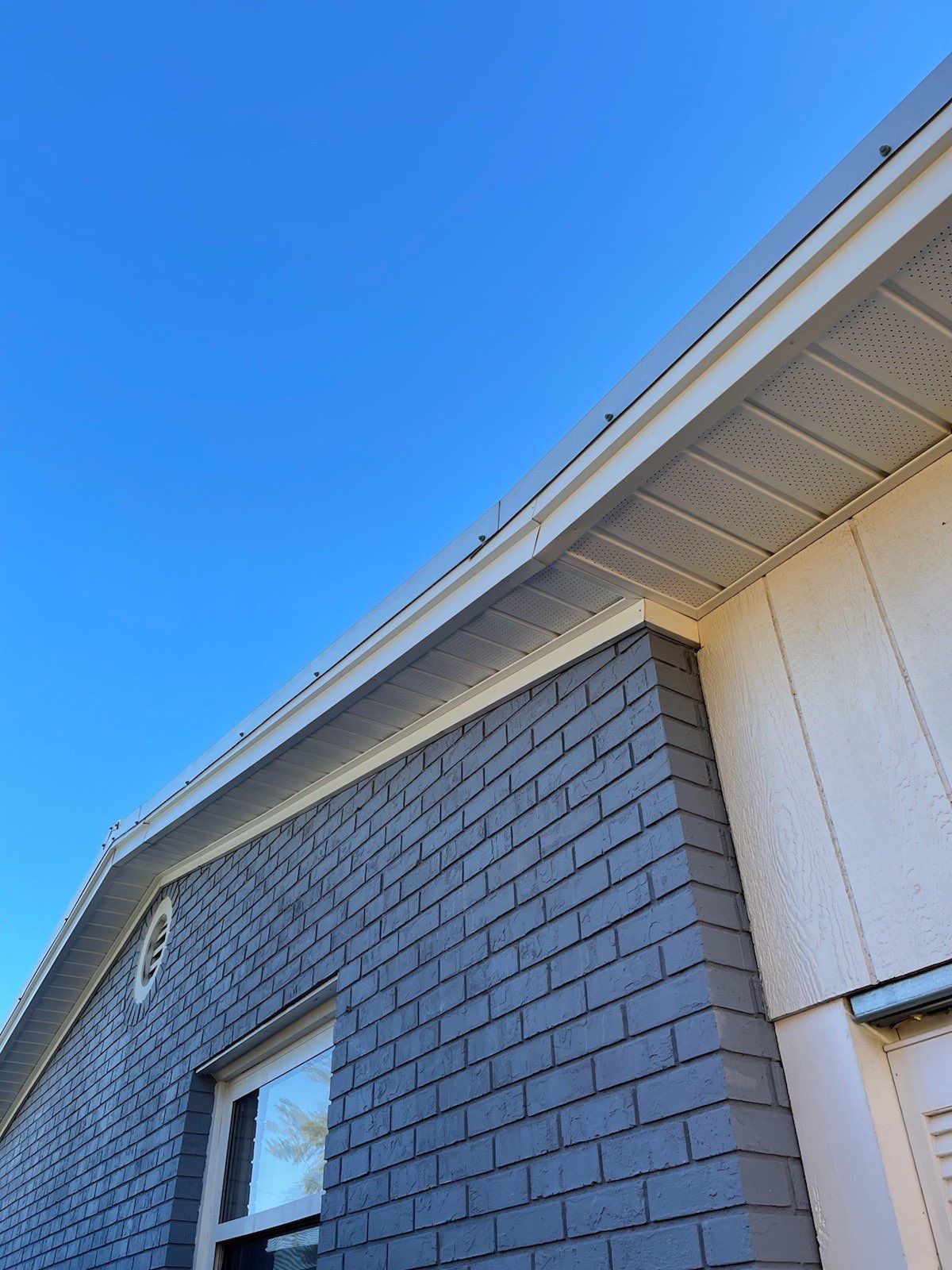 Gutter Installation using K-Style Seamless Gutters and Soffit and Fascia Replacement by Gutter Professors