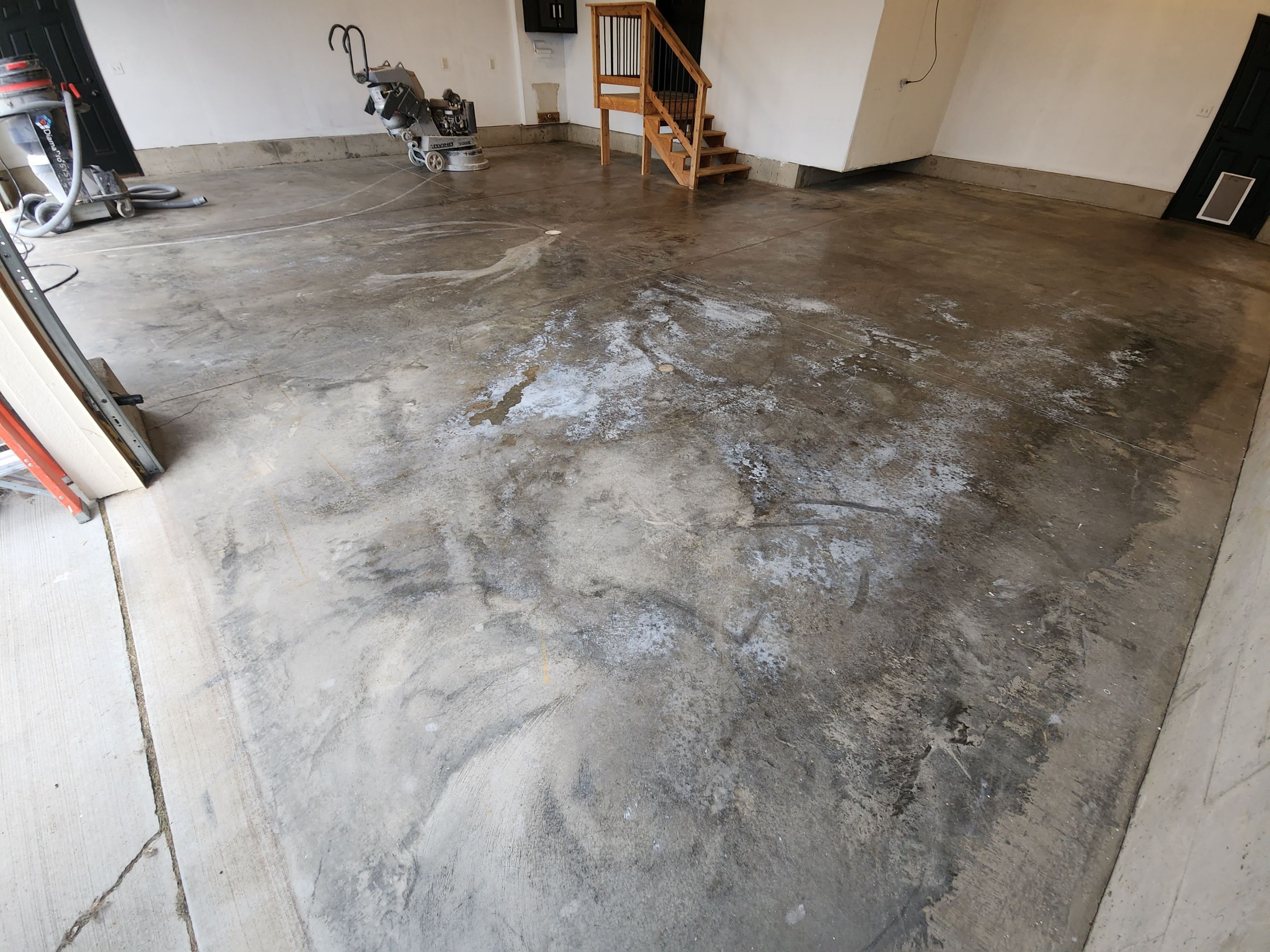 Domino Flake Garage Floor Epoxy Coating in Brandon by Select Painting, Coatings & Garage Cabinets