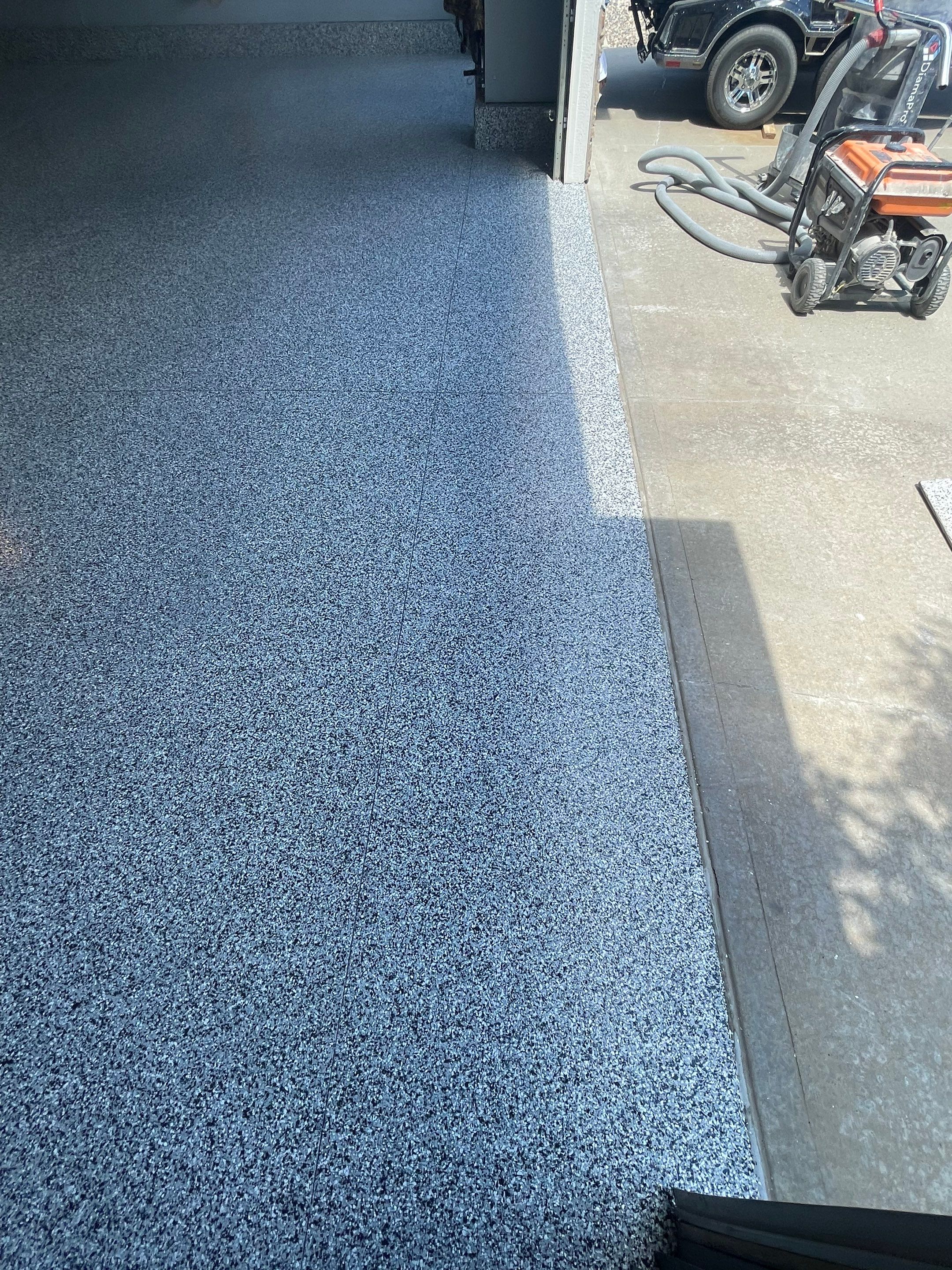 Residential Garage Floor Coating in Sioux Falls by Select Painting, Coatings & Garage Cabinets