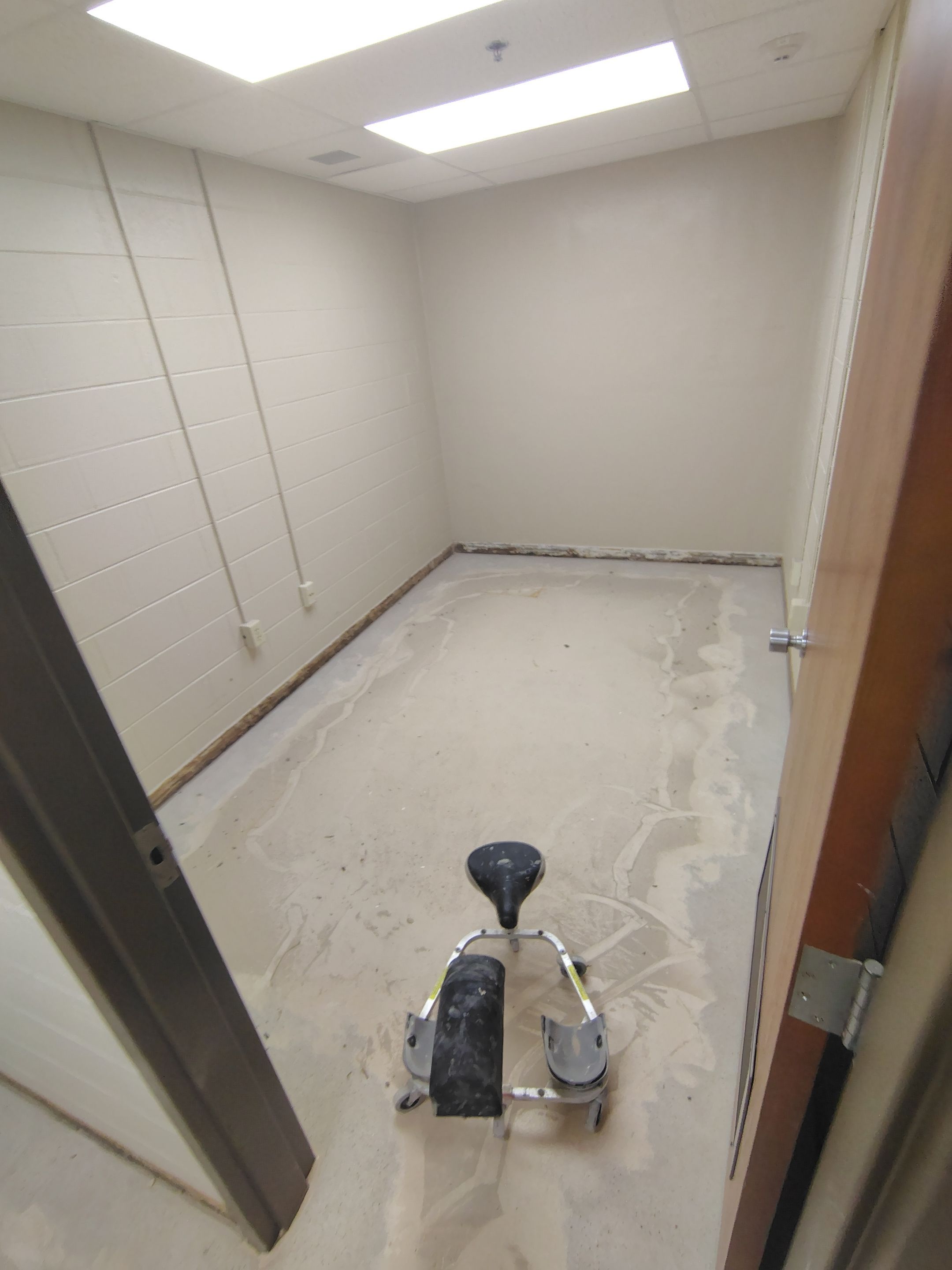Industrial Flake Epoxy Floor Installation at Pierre National Guard Facility by Select Painting, Coatings & Garage Cabinets