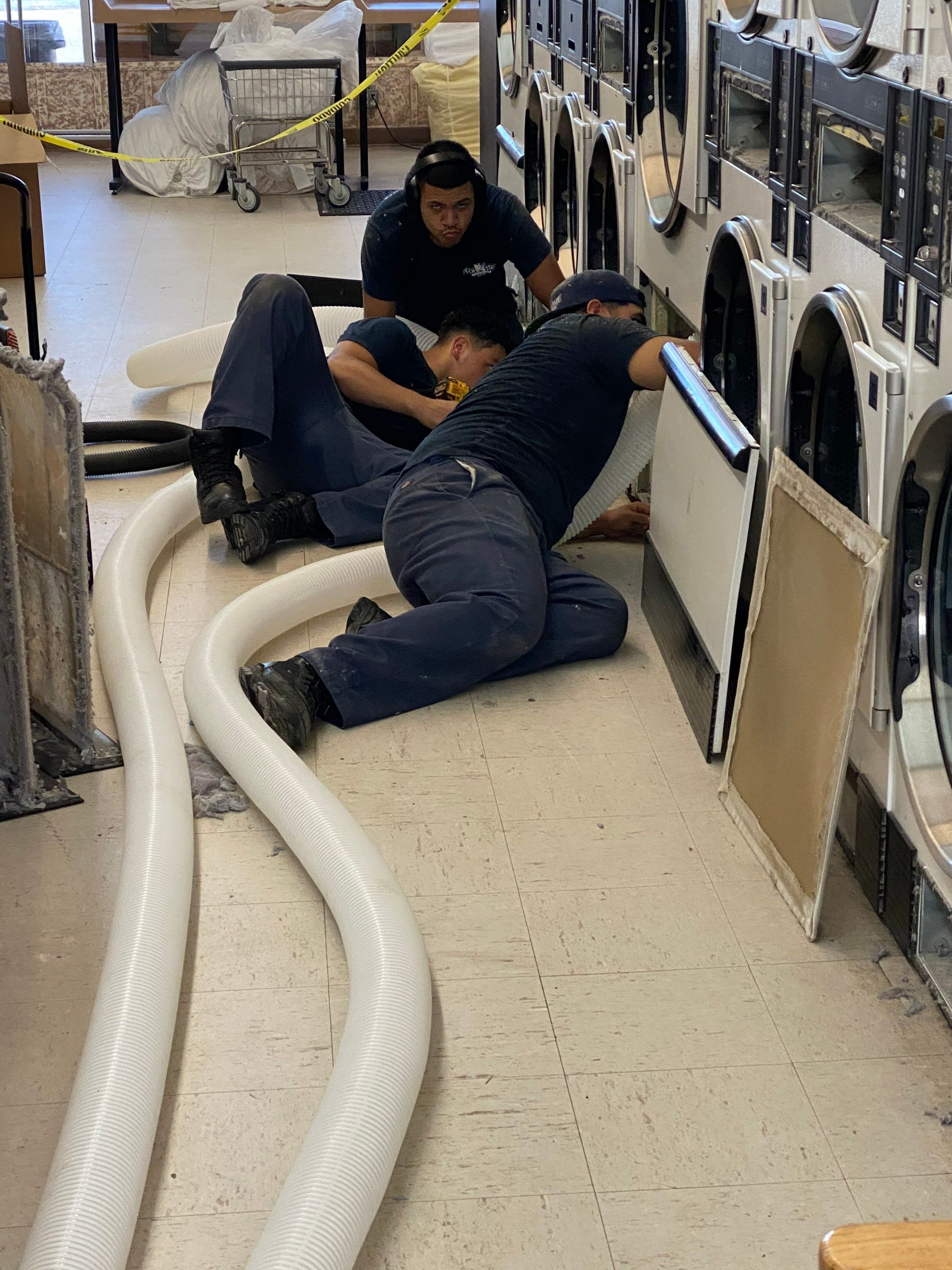 Laundromat Dryer Vent Deep Cleaning using Gas Powered Vac by Peach State Dryer Vents & Air Ducts