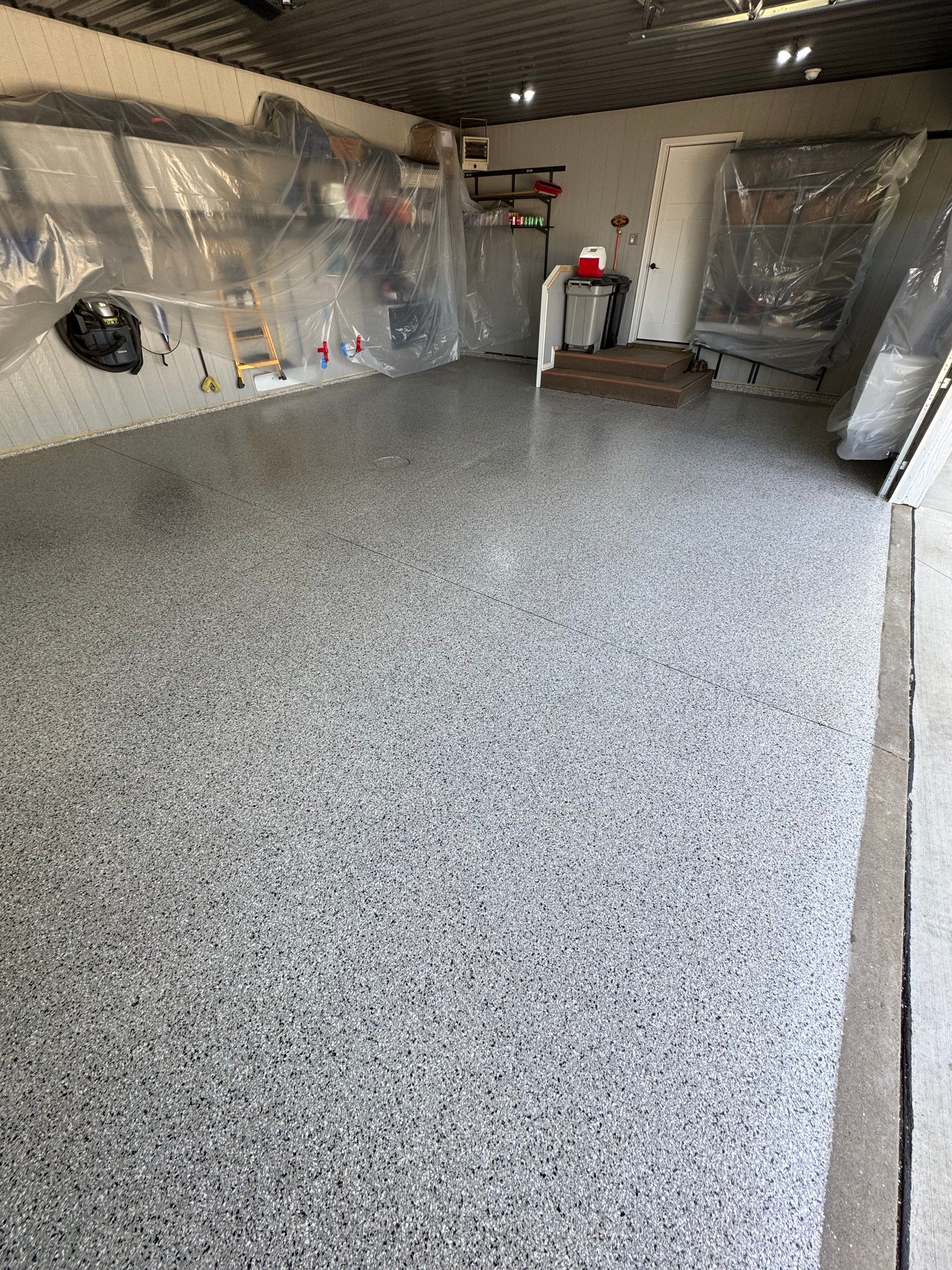 High-Gloss Grey Epoxy Floor Coating for Inwood Garage by Select Painting, Coatings & Garage Cabinets
