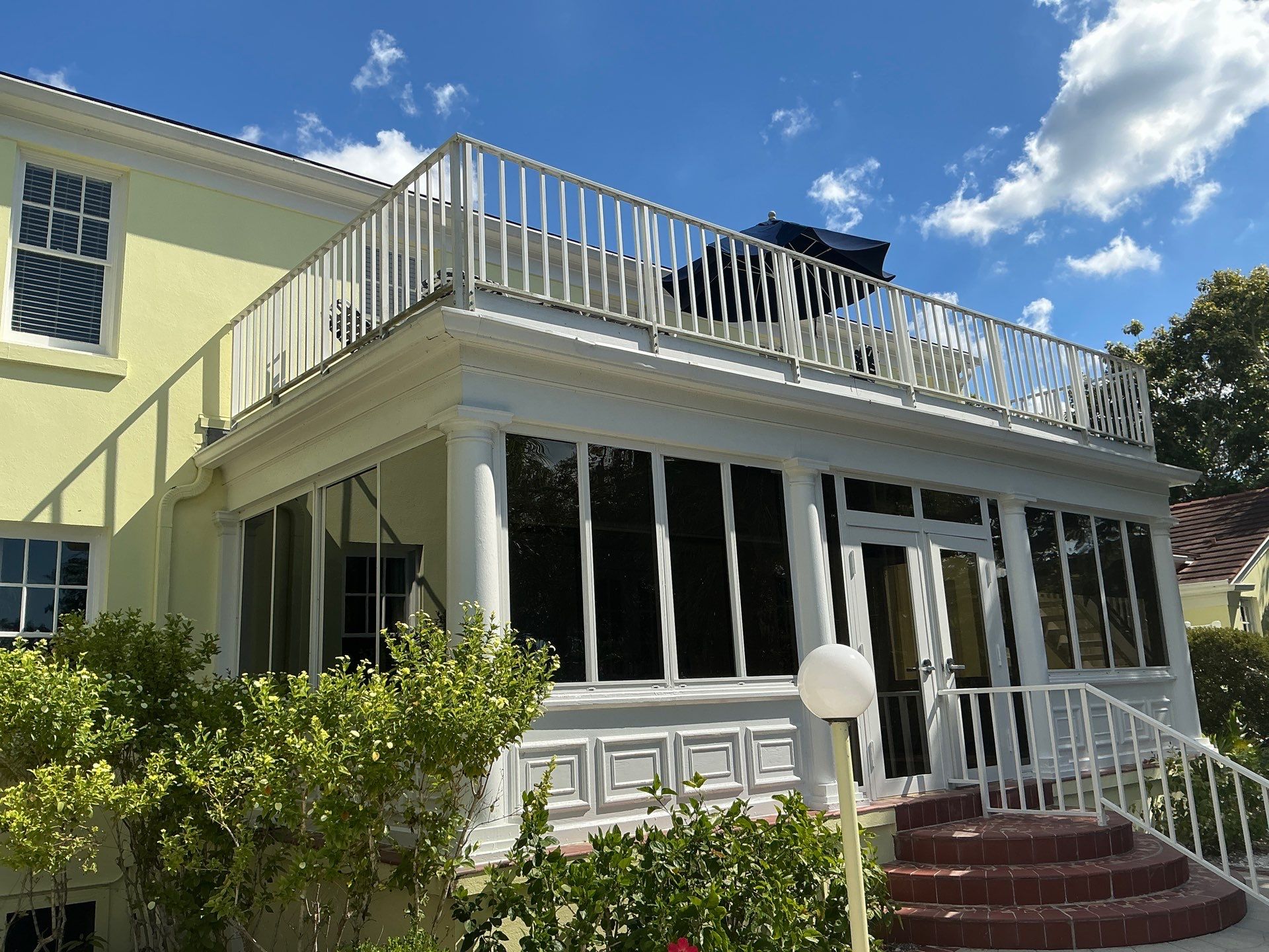 Clean Gutters and Roof in Sarasota FL by Gutter Professors