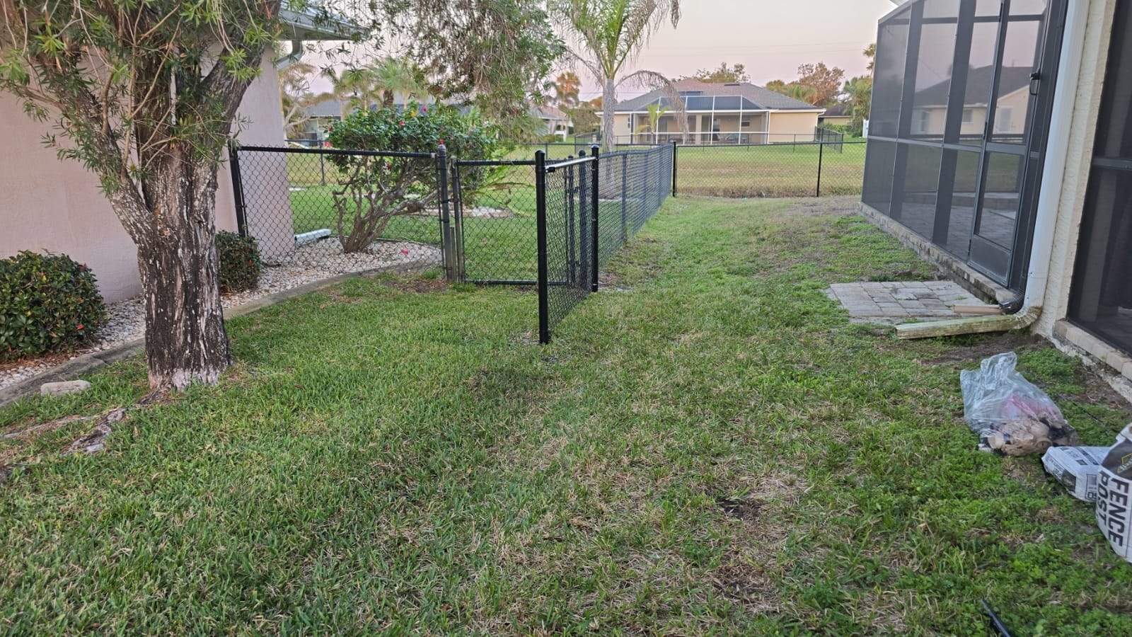 Waterfront Black Chain Link Fence Installation in Rotonda West by True Fence LLC