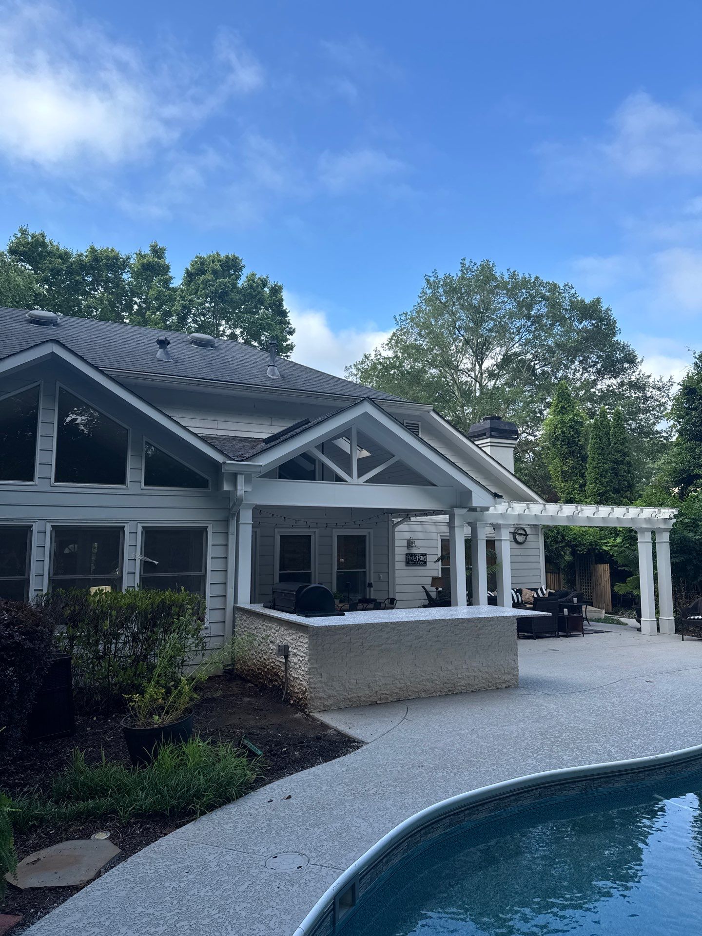 Marietta Poolside Pavilion with Custom Outdoor Kitchen and Pergola by Swift Home Renovations