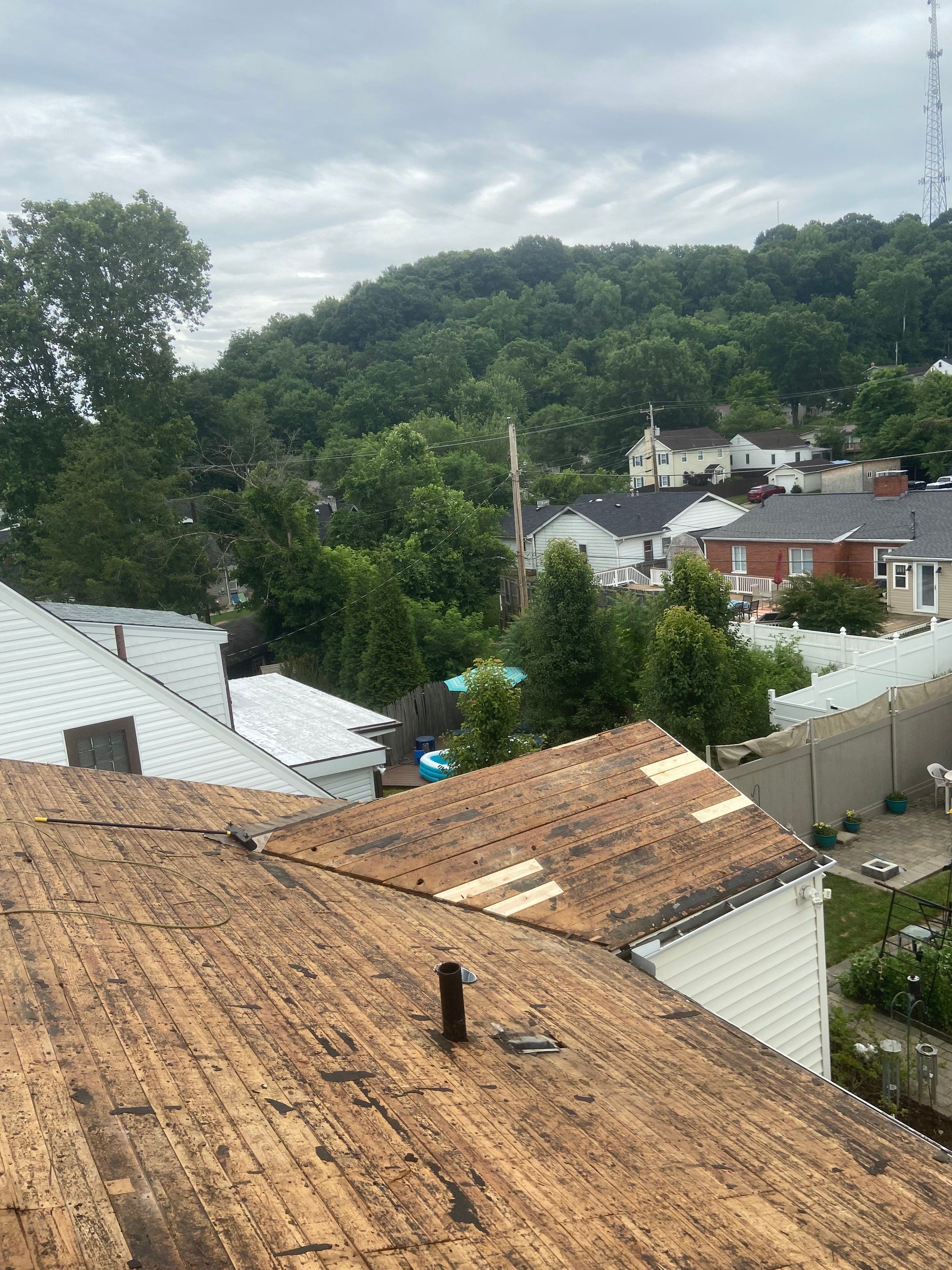 Metal Roofing, Skylights, Porch Build by Secure Construction Company Inc
