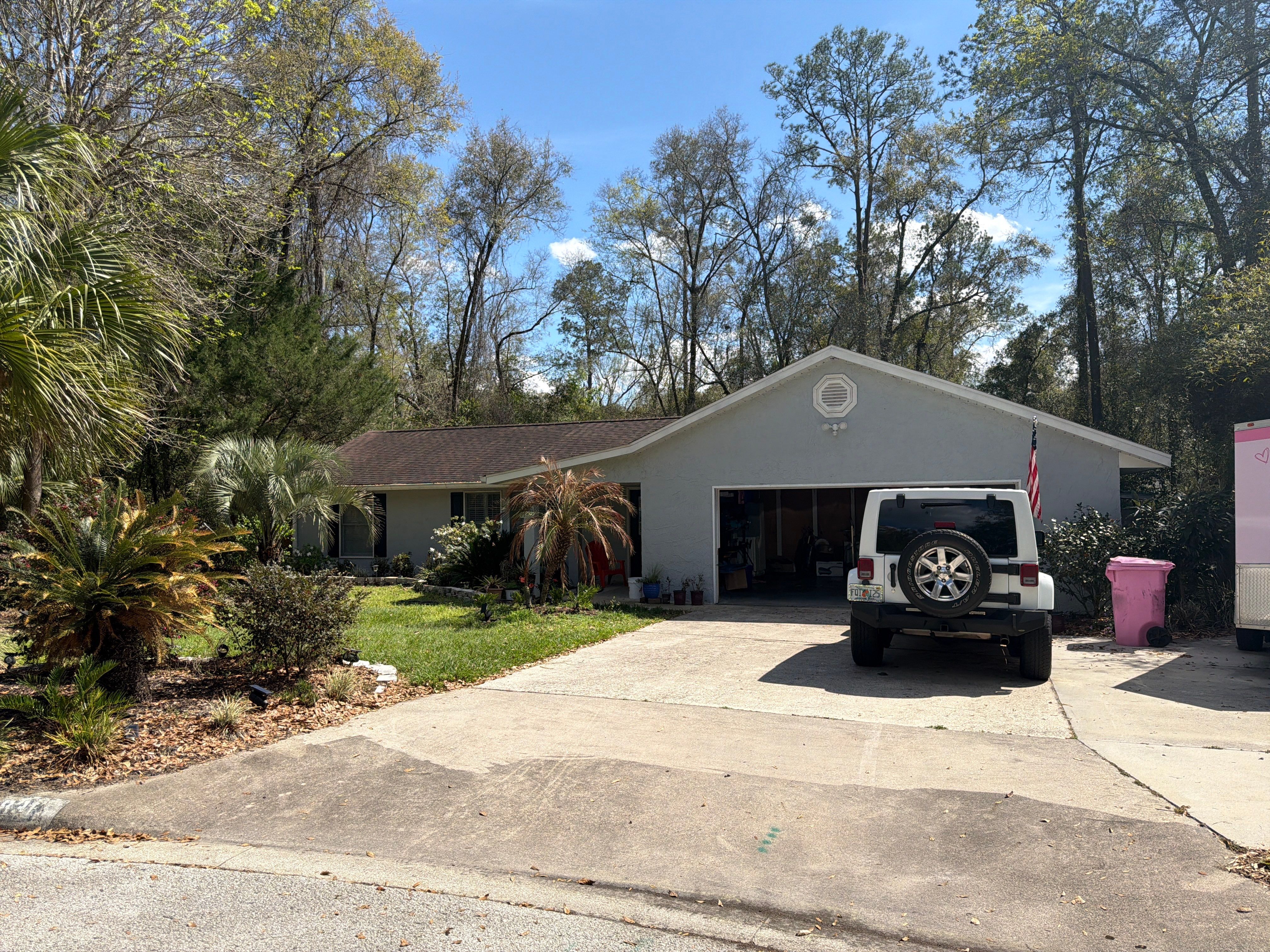 Custom Sliding Glass Door Installation with Integrated Pet Doors in Gainesville by Windows & Doors Store