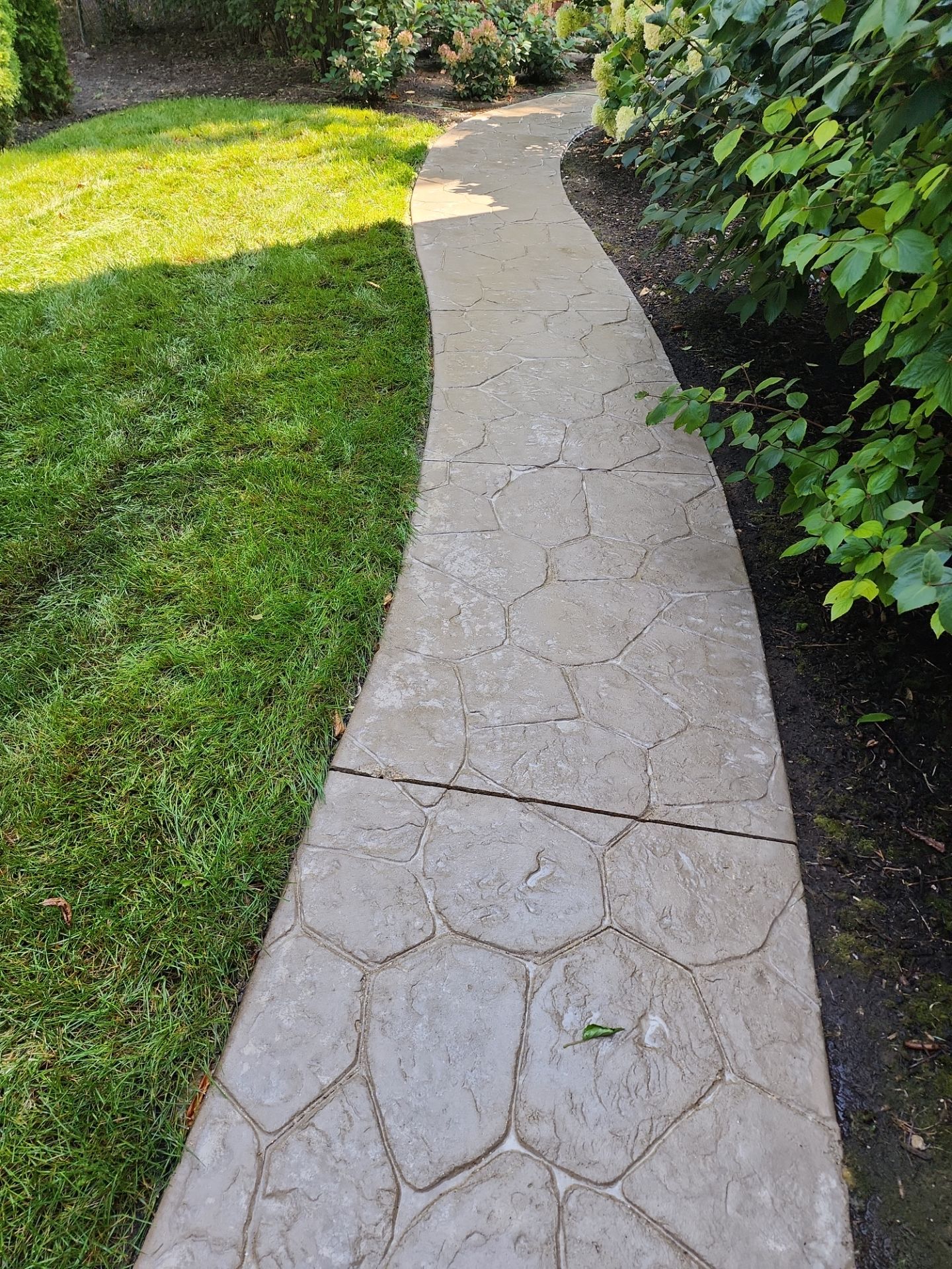 Stamped Concrete Surface Cleaning by Northern Power Washing LLC.